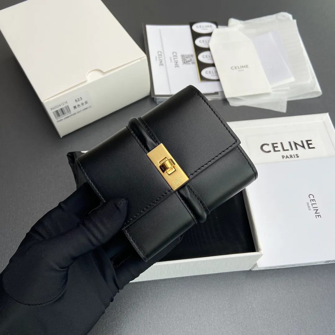 [Extra-grade pure steel hardware original leather] ¥800 TRIOMPHE glossy cow leather wallet cow leather cow leather lining rotating lock closure 5 card slots 1 folding coin bag with snap button 1 flat pocket 1 banknote bag No.: 10M523GCG.04LU 523 523 Black full leather Size: w10.5×9×3cm.
