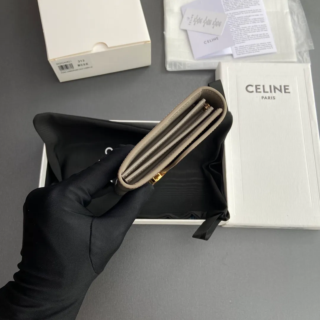 [Special grade pure steel hardware original leather] ¥740 TRIOMPHE shiny cow leather wallet / 12 card slots 1 zipper coin pocket 1 flat pocket 2 gusseted compartments Number: 10E313DPV.38NO 312 313 Pebble color full leather Size: w19×10×3cm