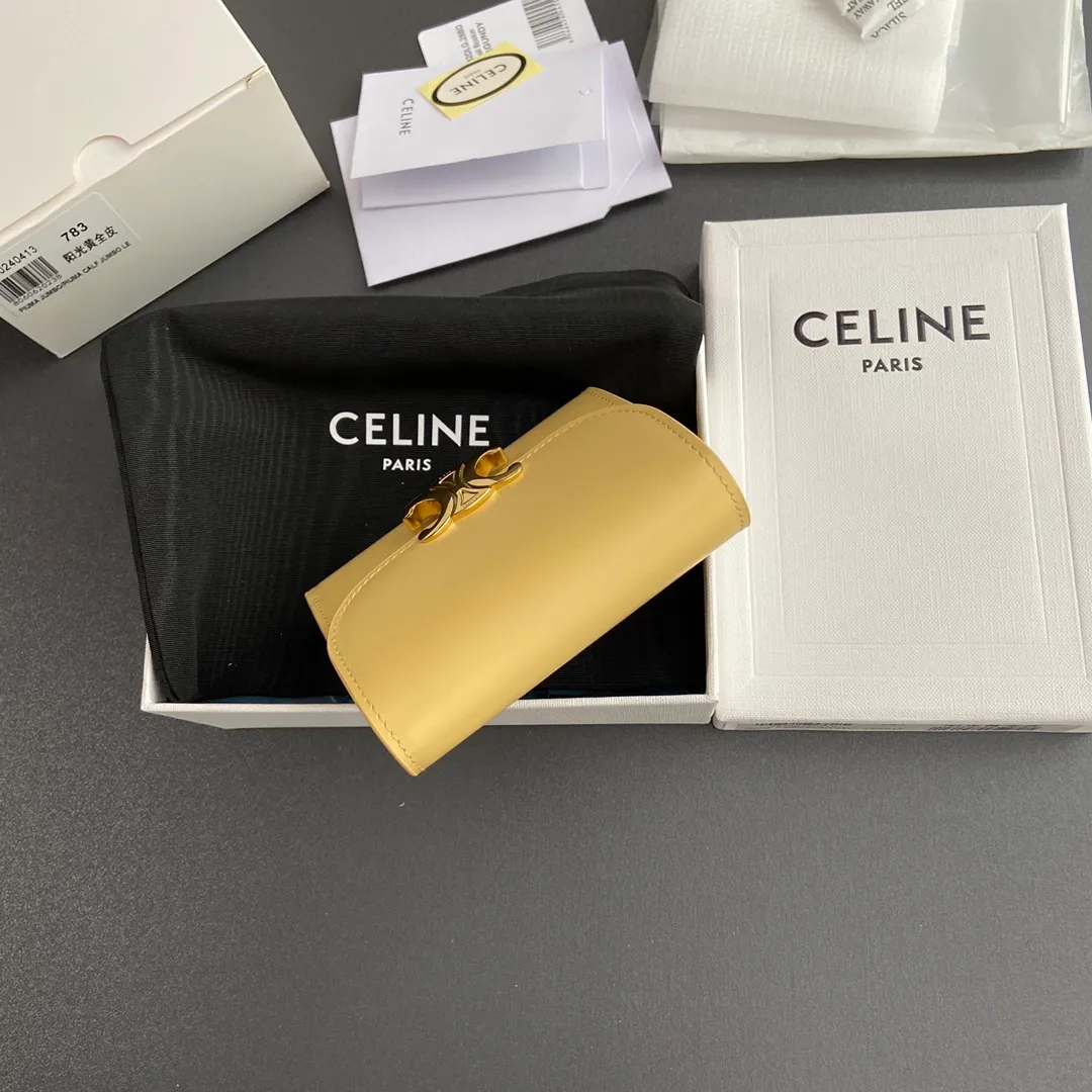 [Special grade pure steel hardware original leather] ¥700 TRIOMPHE glossy cow leather wallet/2024 Xiaosai 5 card slots 1 folding coin bag with snap buckle 1 flat pocket 1 banknote bag No.: 10D782CQH.04LU783 783 sunshine yellow full leather Size: w10.5×9×3cm.