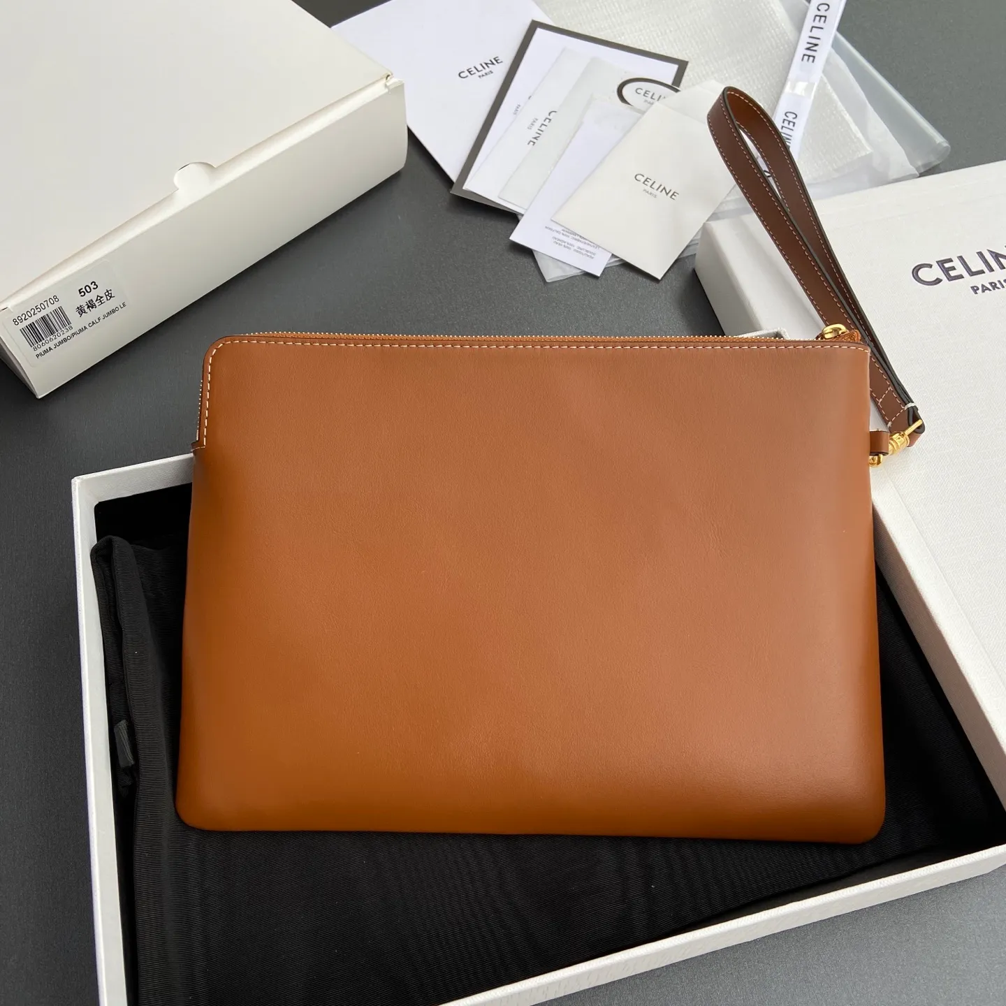 [Extra-grade pure steel hardware original leather] ¥860 TRIOMPHE smooth full leather clutch bag / 1 zipper compartment Detachable wrist strap, about 20 cm in length Lining: cowhide lining Number: 10J502FES.04LU 502 503 Yellow brown full leather Size: w25×h17.5×d1cm