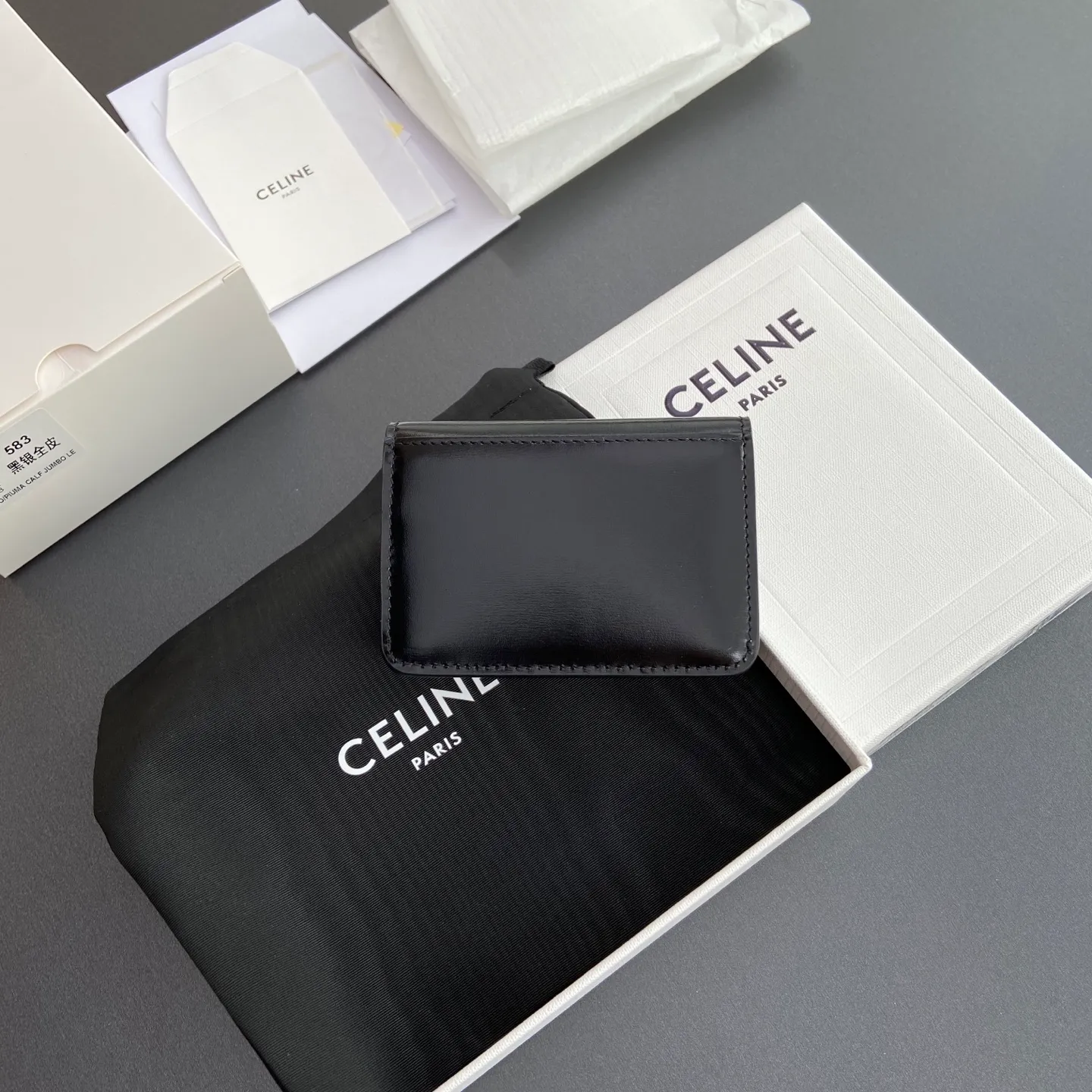 [Extra-grade pure steel hardware original leather] ¥560 TRIOMPHE glossy cow leather flip card holder/snap button closure 1 main compartment 2 inner card slots 1 inner flat pocket 1 outer flat pocket Number: 10I582CPJ.04LU 583 Black Silver Size: w10×h7.5×d2cm