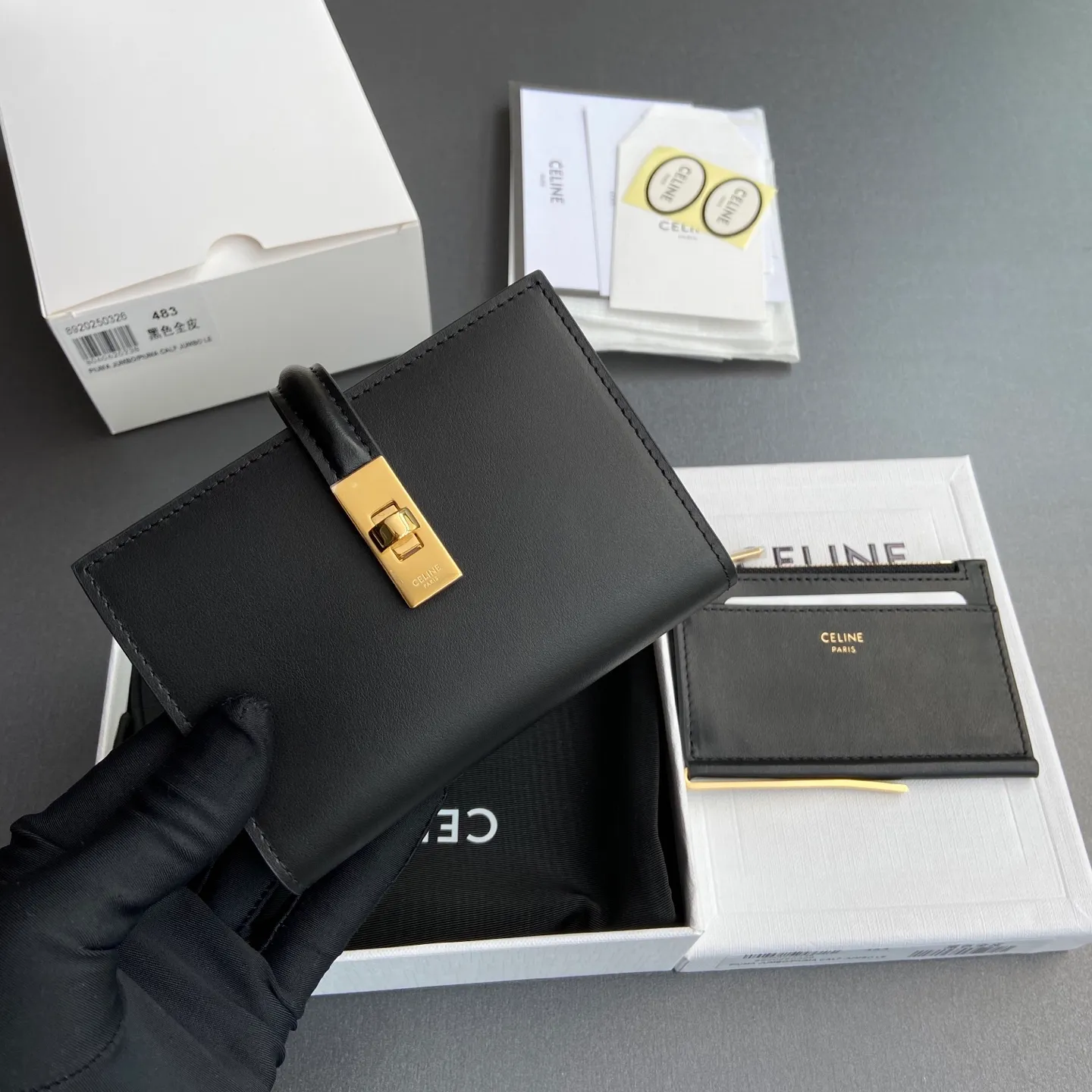 [Extra-grade pure steel hardware original leather] ¥840 TRIOMPHE16 glossy cow leather wallet cow leather cow leather lining/fabric gold finish rotating lock closure 1 detachable zipper movable coin pocket 7 card slots 1 banknote pocket 4 gusseted compartments No.: 10M483CQ7.04LU483 483 Black full leather Size:w12.7×h9×d2.5cm
