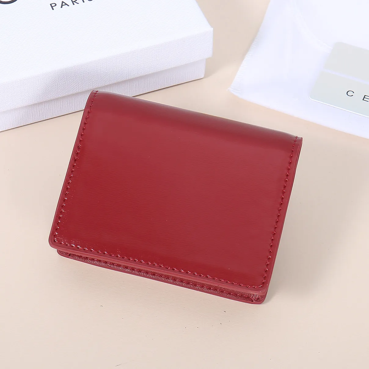 💰130, Celine's new card holder, TRIOMPHE business card holder, large cowhide with plain microfiber interior, gold finish TRIOMPHE metal snap closure, 1 thickened main compartment, 3 inner card slots. No.: 10N063 Size: 10.5x8.5x3 cm
