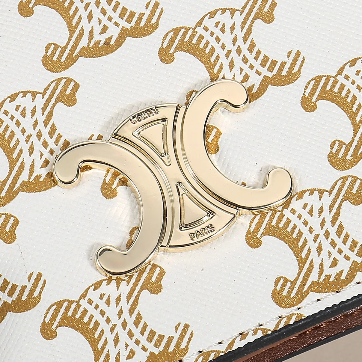 60. Celine classic card holder, TRIOMPHE business card holder, large cowhide interior with plain microfiber TRIOMPHE CANVAS logo print, gold finish TRIOMPHE metal snap closure, 1 zipper coin pocket, 5 card slots, 1 banknote pocket, 1 flat pocket No.: 10K623 Size: 11 X 9 X 3 cm