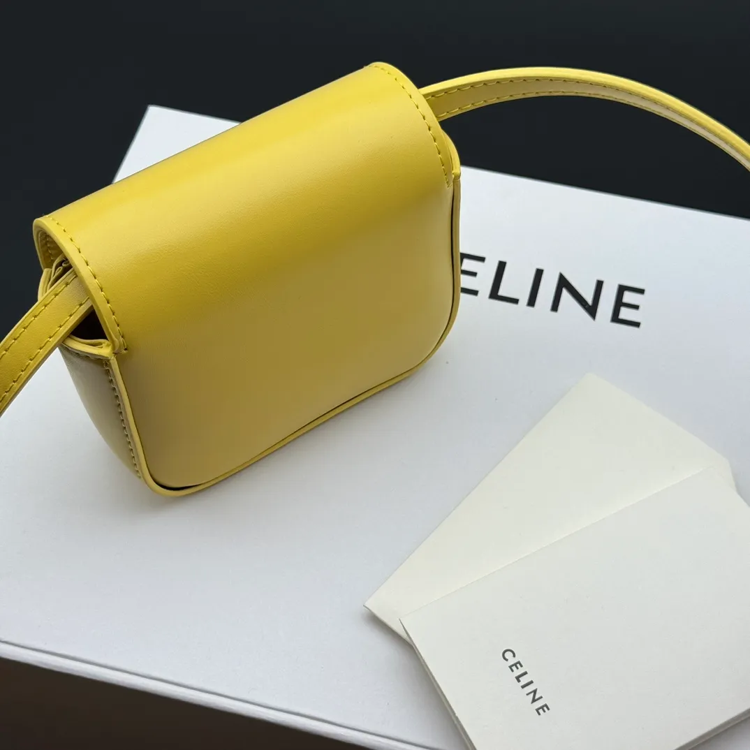 💰230 💎Upgraded original version💖 Comes with gift box 𝗖𝗘𝗟𝗜𝗡𝗘 | 𝗧𝗥𝗜𝗢𝗠𝗣𝗛𝗘 𝗠𝗜𝗡𝗜 Arc de Triomphe Mini Crossbody Bag〰️ Yellow# (Calfskin) Arc de Triomphe and minimalist inspiration collide. Beautiful to the core. The shape of the bag is simply the golden ratio. Small and delicate. The more you look at it, the better it looks. It gives people a French gentle style🍃. Carrying it on the body is like an exquisite work of art. Made of genuine Italian leather. The texture of the leather is perfect. 𝑠　𝑧𝑒: 𝟭𝟭*𝟴*𝟰𝒄𝒎 Model: 101513/10I513