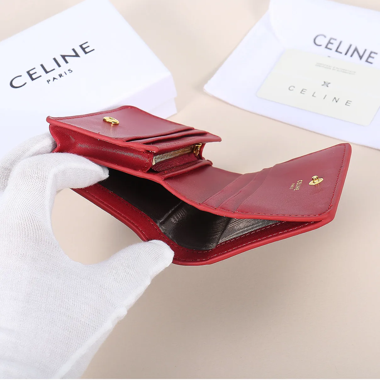 60. Celine classic card holder, TRIOMPHE business card holder, large cowhide interior with plain microfiber TRIOMPHE CANVAS logo print, gold finish TRIOMPHE metal snap closure, 1 zipper coin pocket, 5 card slots, 1 banknote pocket, 1 flat pocket No.: 10K623 Size: 11 X 9 X 3 cm