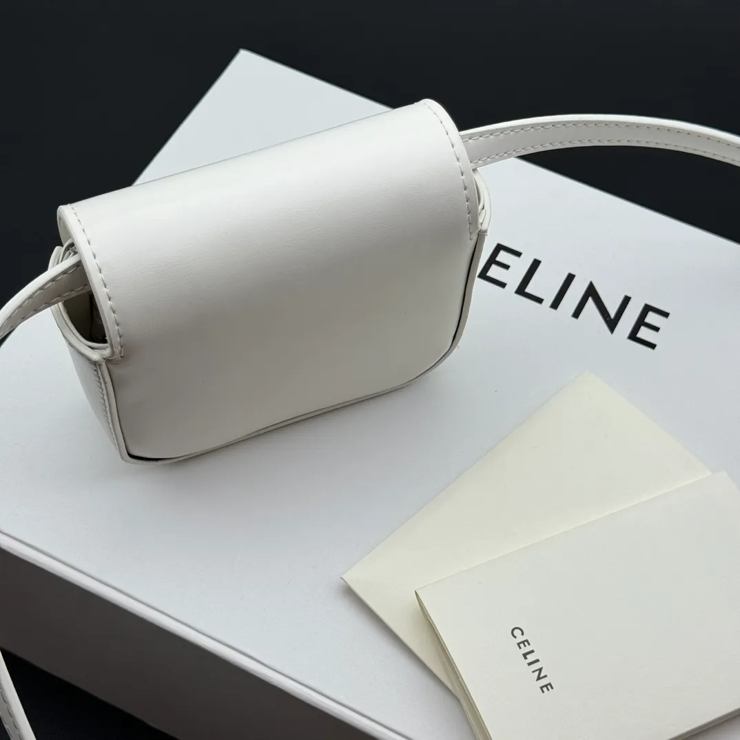 💰230 💎Upgraded original version💖 Comes with gift box 𝗖𝗘𝗟𝗜𝗡𝗘 | 𝗧𝗥𝗜𝗢𝗠𝗣𝗛𝗘 𝗠𝗜𝗡𝗜 Arc de Triomphe Mini Crossbody Bag〰️ White# (Calfskin) Arc de Triomphe and minimalist inspiration collide. Beautiful to the core. The shape of the bag is simply the golden ratio. Small and delicate. The more you look at it, the better it looks. It gives people a French gentle style🍃. Carrying it on the body is like an exquisite work of art. Made of genuine Italian leather. The texture of the leather is perfect. 𝑠　𝑧𝑒: 𝟭𝟭*𝟴*𝟰𝒄𝒎 Model: 101513/10I513