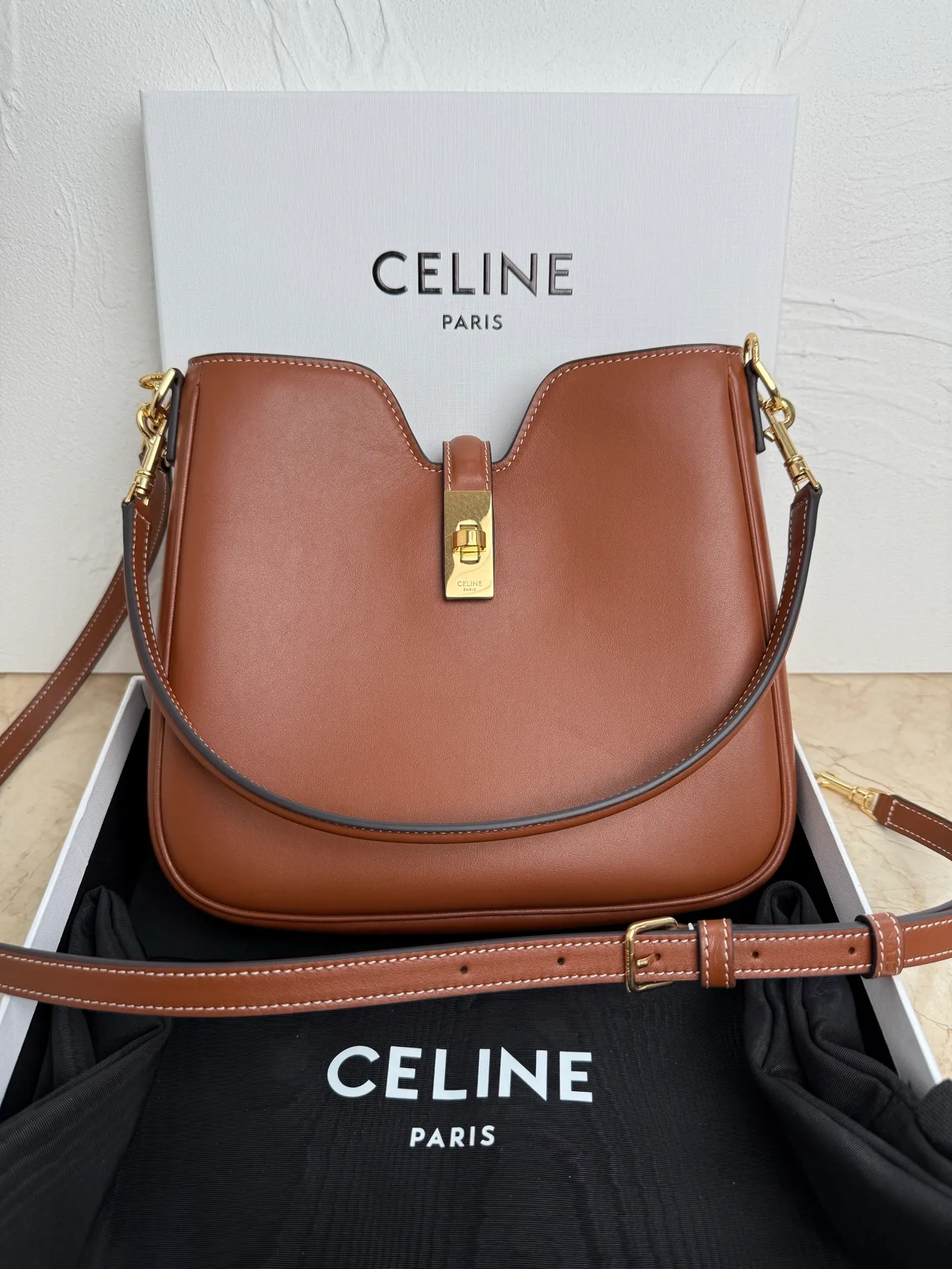 p1600 CAMILLE 16💓2025 New SOFT Small Smooth Cow Leather Handbag👜This model cannot fit larger smart tablets such as IPAD. Cow leather Sheep leather lining Hand carry, shoulder and crossbody Rotary lock closure 1 main compartment 1 inner zipper pocket 1 detachable hand/shoulder strap, length 8.6 inches (22 cm) 1 detachable and adjustable shoulder strap, 9.7 X 8.5 X 2 inches (24.5 X 21.5