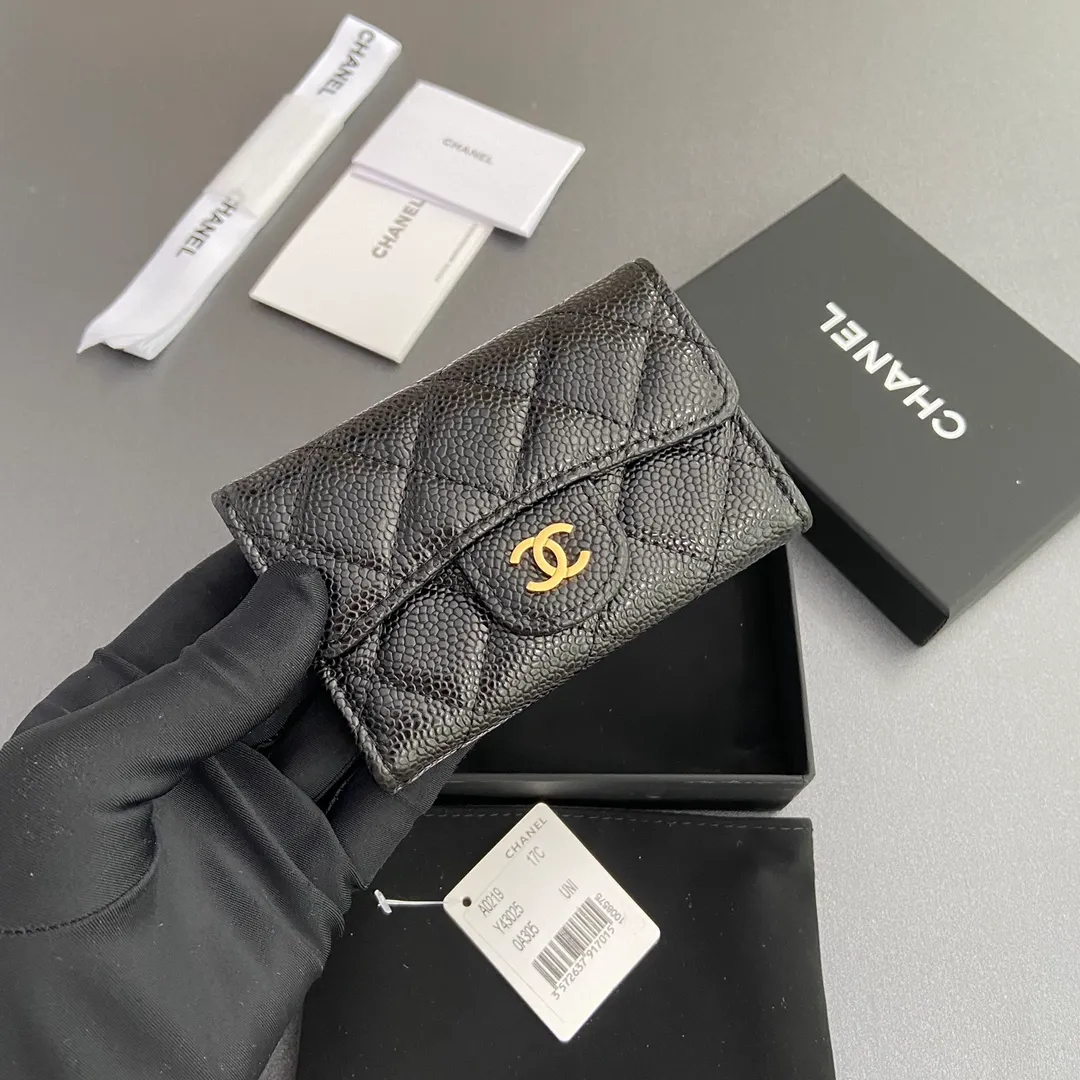 Xiaoxiang imported Italian leather Item number: AP438 (inner compartment with zipper) 💰: 280 Size: w11×h7cm Color: black ball pattern golden steel mark