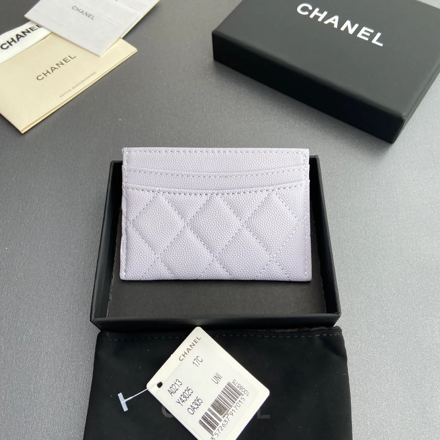 Xiaoxiang imported Italian leather Item number: A31510 0213 Price: 190 Size: w11×h7.5cm Color: Light purple ball pattern gold steel mark