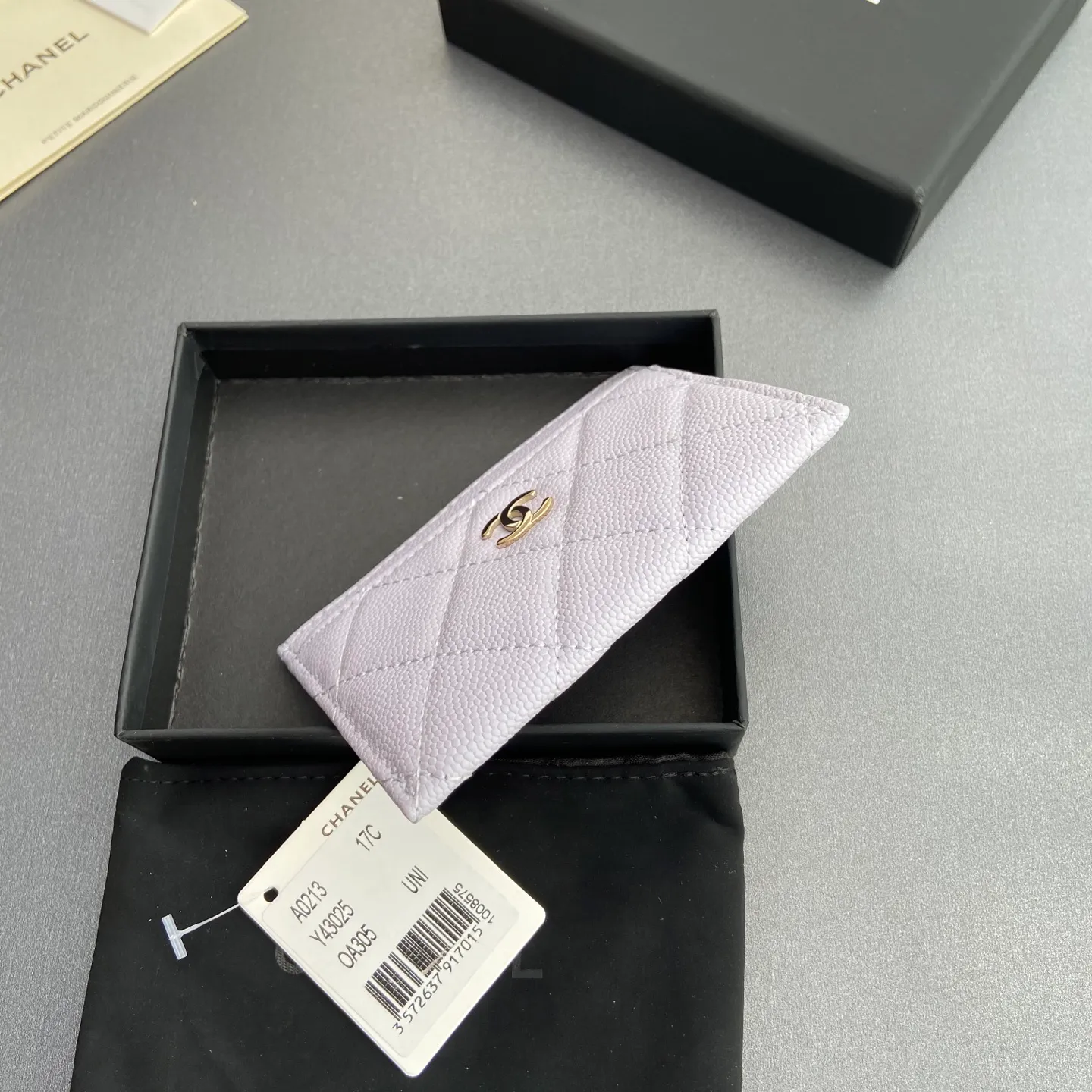 Xiaoxiang imported Italian leather Item number: A31510 0213 Price: 190 Size: w11×h7.5cm Color: Light purple ball pattern gold steel mark
