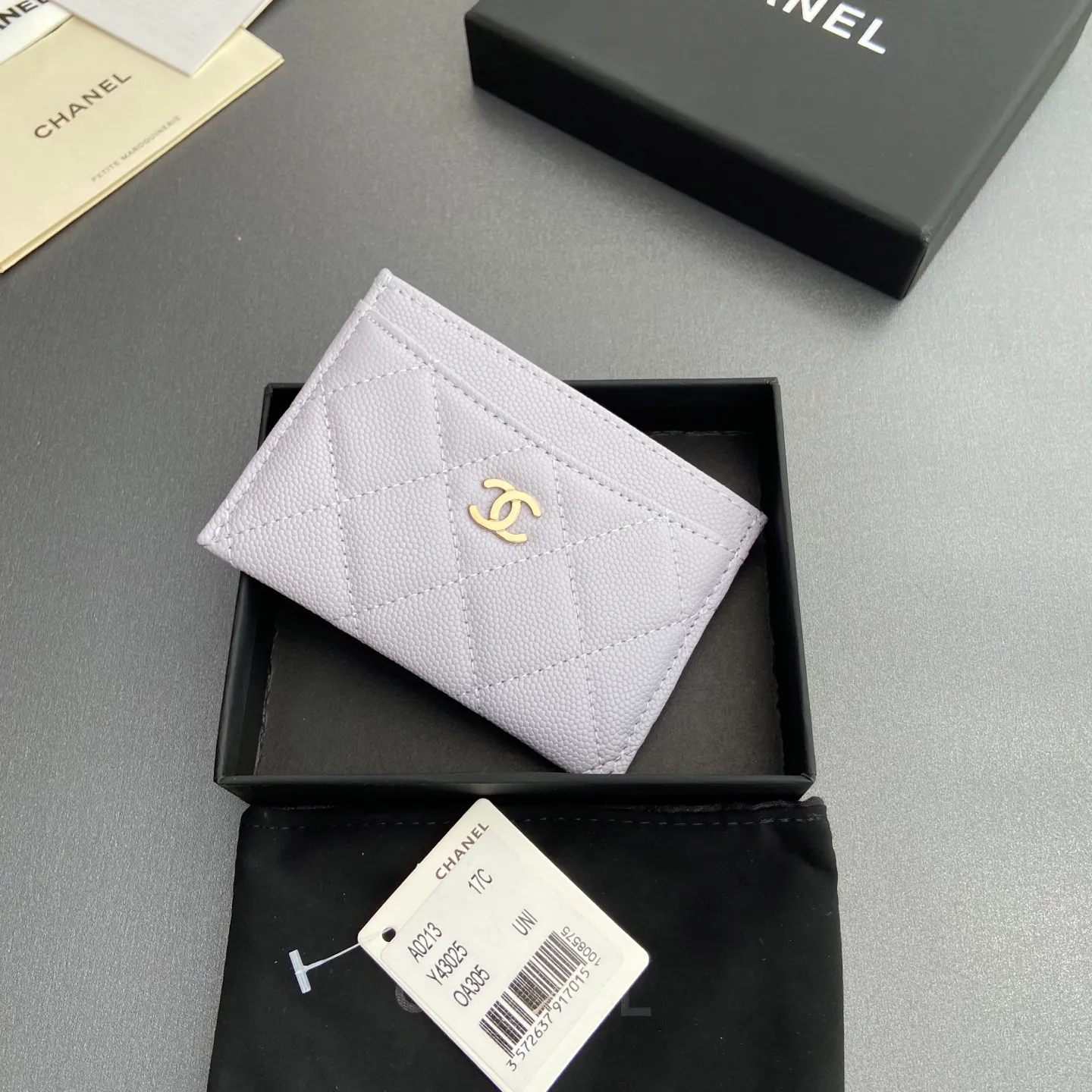 Xiaoxiang imported Italian leather Item number: A31510 0213 Price: 190 Size: w11×h7.5cm Color: Light purple ball pattern gold steel mark