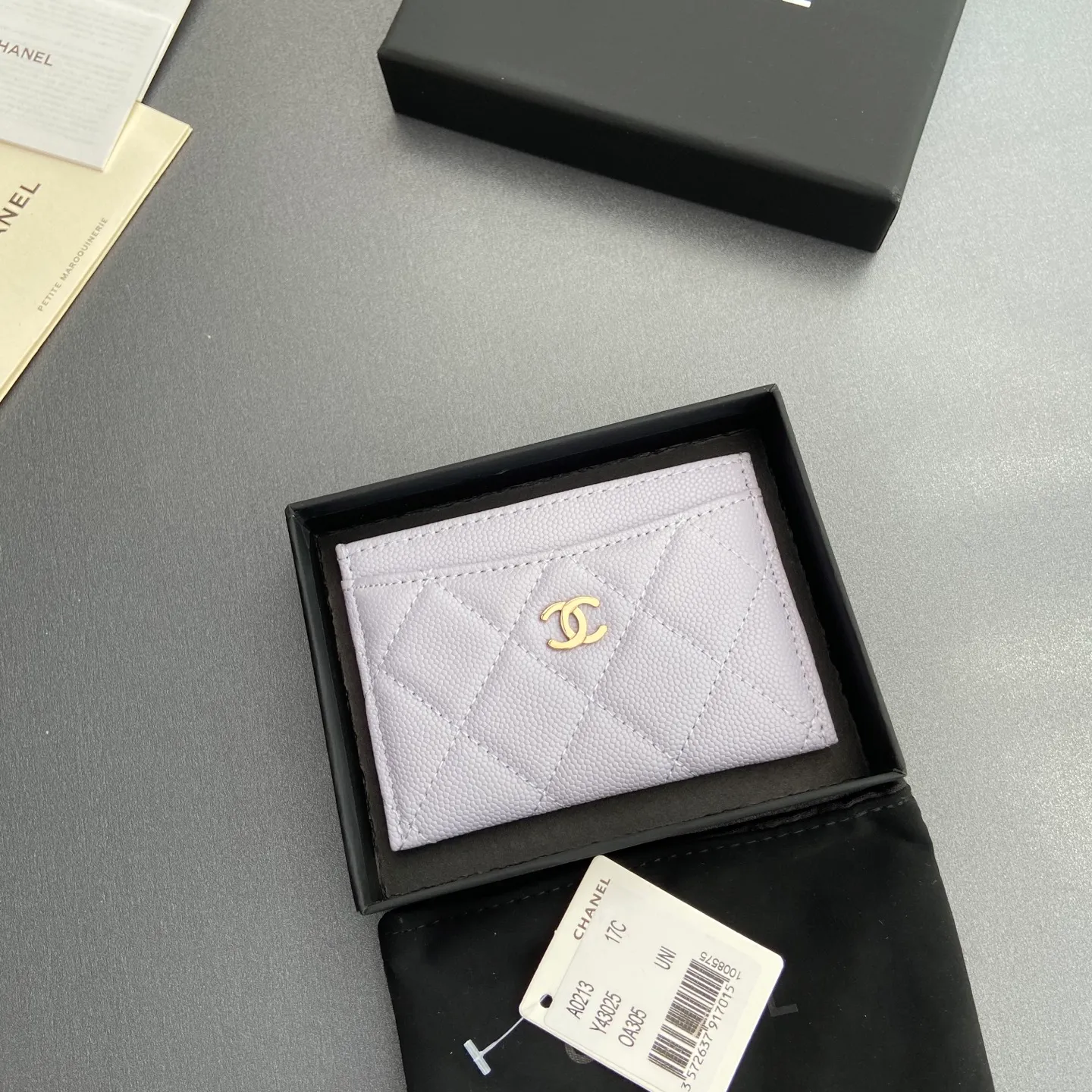 Xiaoxiang imported Italian leather Item number: A31510 0213 Price: 190 Size: w11×h7.5cm Color: Light purple ball pattern gold steel mark