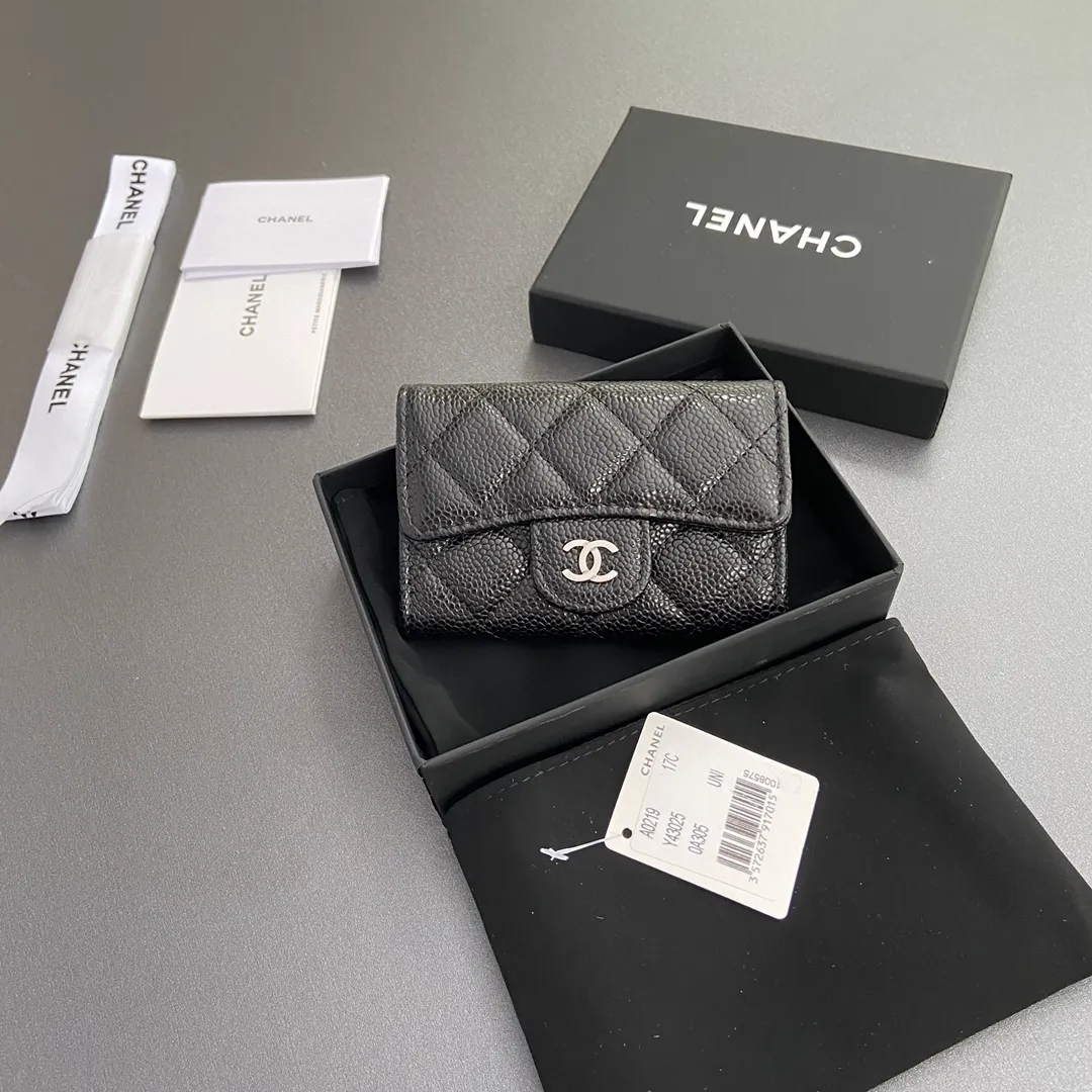 Xiaoxiang imported Italian leather Item number: AP438 (inner compartment with zipper) 💰: 280 Size: w11×h7cm Color: black ball pattern silver steel mark