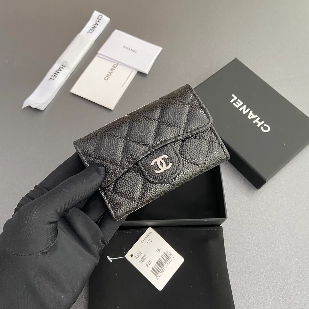 Xiaoxiang imported Italian leather Item number: AP438 (inner compartment with zipper) 💰: 280 Size: w11×h7cm Color: black ball pattern silver steel mark