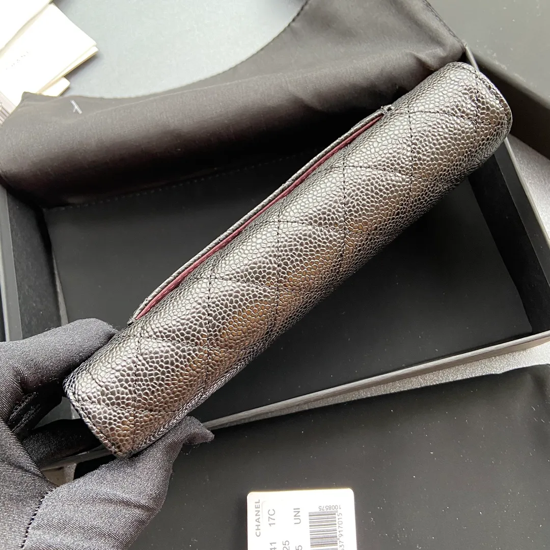 Xiaoxiang imported Italian grained cowhide Item No.: A0241 Long clip with back pocket on the back Price: 480 Size: w19×h10.5×3cm Color: Black ball pattern gold steel mark
