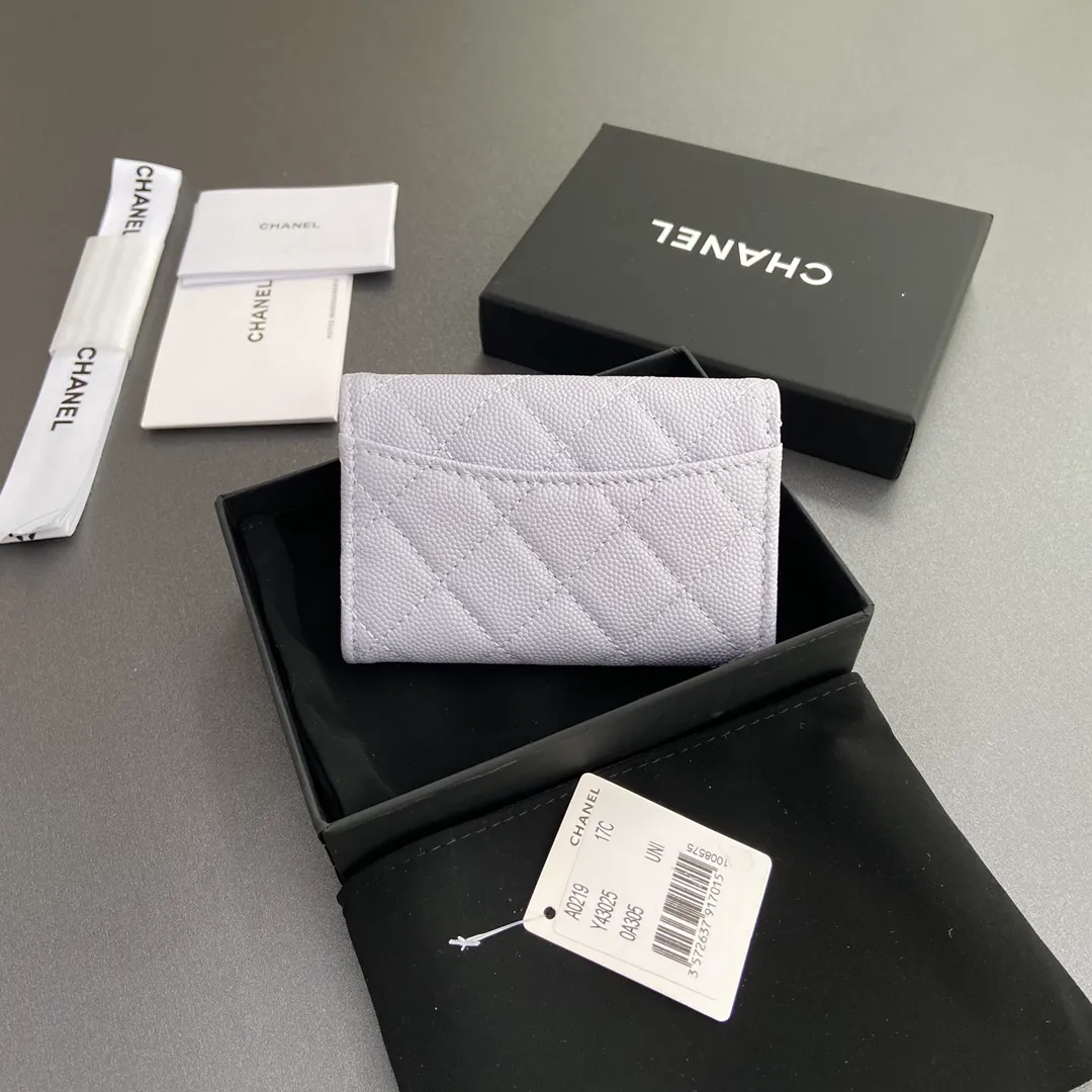 Xiaoxiang imported Italian leather Item number: AP438 (inner compartment with zipper) 💰: 280 Size: w11×h7cm Color: light purple fine ball pattern golden steel mark