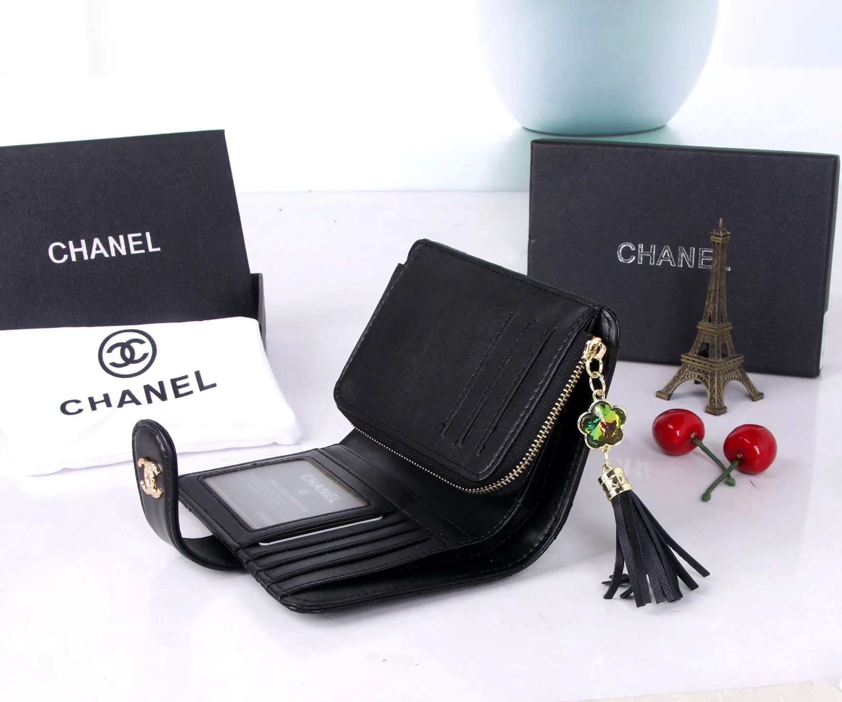 P170 Style No.: 801 Brand: Chanel Color: Black Pink Size: 15*10*3 Description: The latest models from Chanel counters are now available! Made of first-layer lambskin, the workmanship is exquisite, comparable to the counters! Multifunctional small wallet with rich interior compartments, super practical!