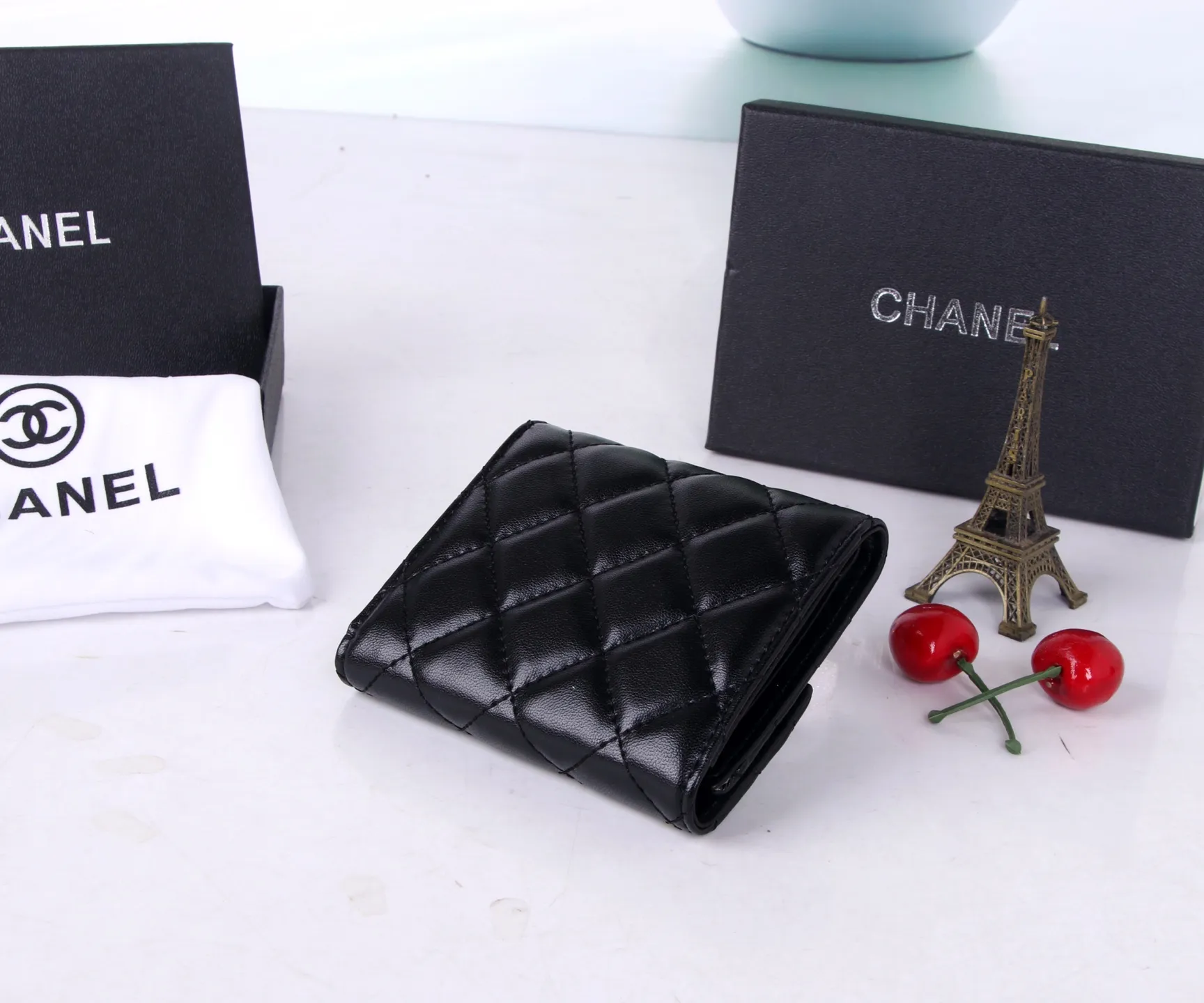P170 Style No.: 803 Brand: Chanel Color: Black Maroon Size: 11*10*2 Description: Chanel’s autumn and winter new styles are now available! Made of first-layer sheepskin inside and outside, the workmanship is exquisite, comparable to that of counters! Multifunctional tri-fold small wallet, super practical!