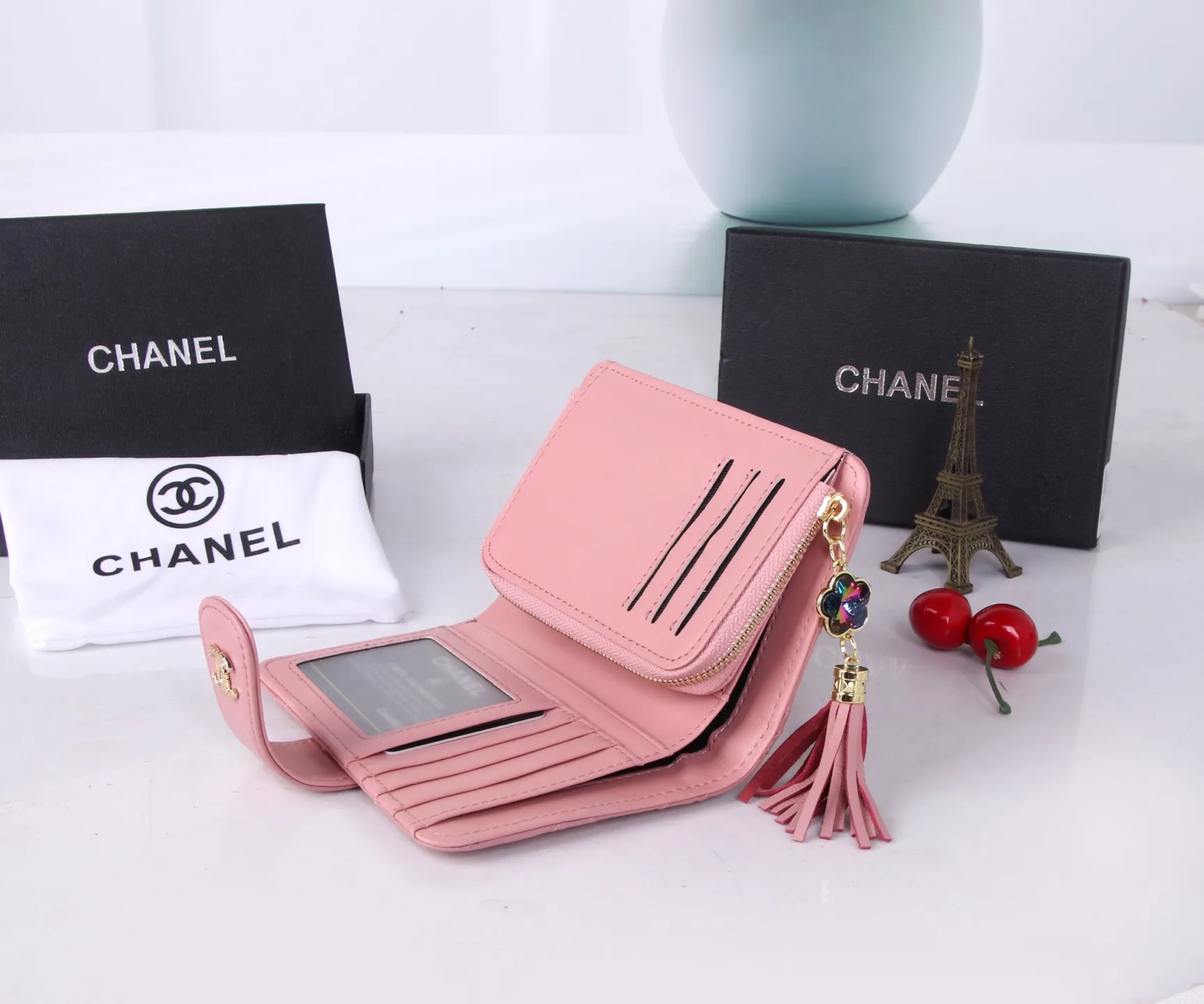 P170 Style No.: 801 Brand: Chanel Color: Black Pink Size: 15*10*3 Description: The latest models from Chanel counters are now available! Made of first-layer lambskin, the workmanship is exquisite, comparable to the counters! Multifunctional small wallet with rich interior compartments, super practical!