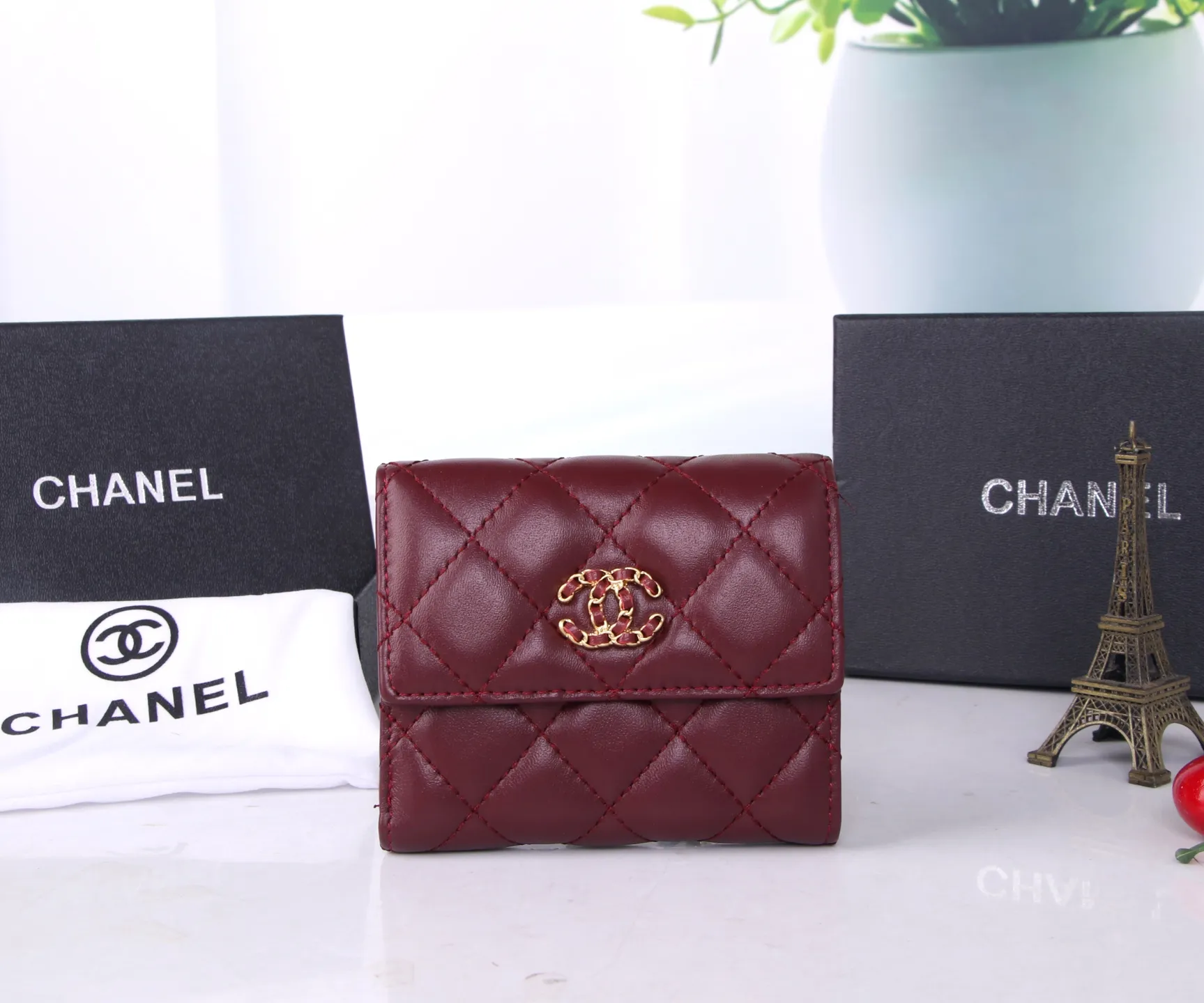 P170 Style No.: 803 Brand: Chanel Color: Black Maroon Size: 11*10*2 Description: Chanel’s autumn and winter new styles are now available! Made of first-layer sheepskin inside and outside, the workmanship is exquisite, comparable to that of counters! Multifunctional tri-fold small wallet, super practical!