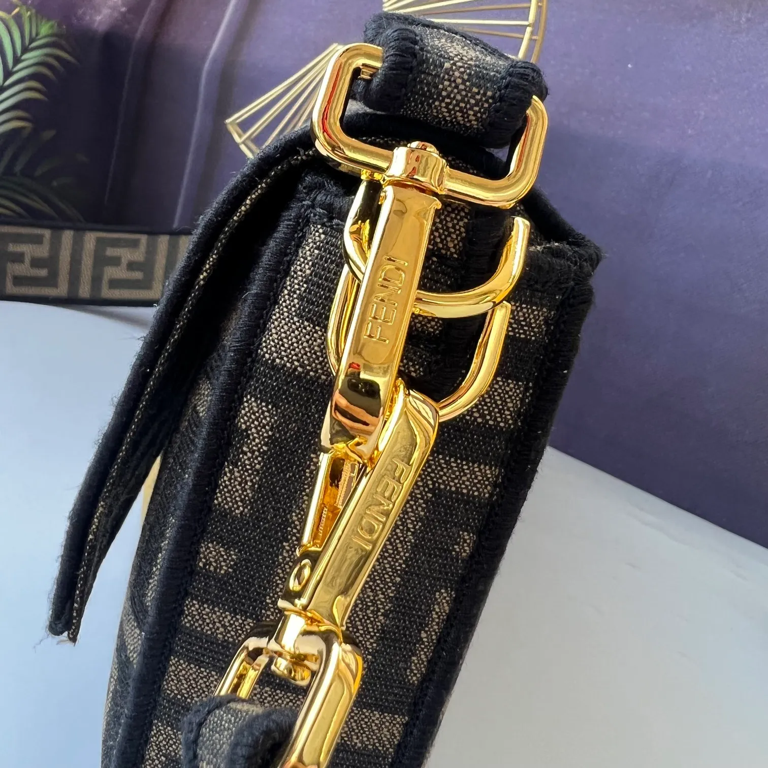 All Categories Official Website "Brand Women's Bags" Women's Bags 💙 FENDI The latest FendiVersace co-branded model, the iconic Baguette medium handbag adopts a clamshell design and is equipped with FF magnetic buckle closure. Lined interior with zip pocket. Comes with a detachable handle or shoulder strap for cross-body or hand carry. Decorated with tonal FF logo embroidery. Contrasting brown leather trim