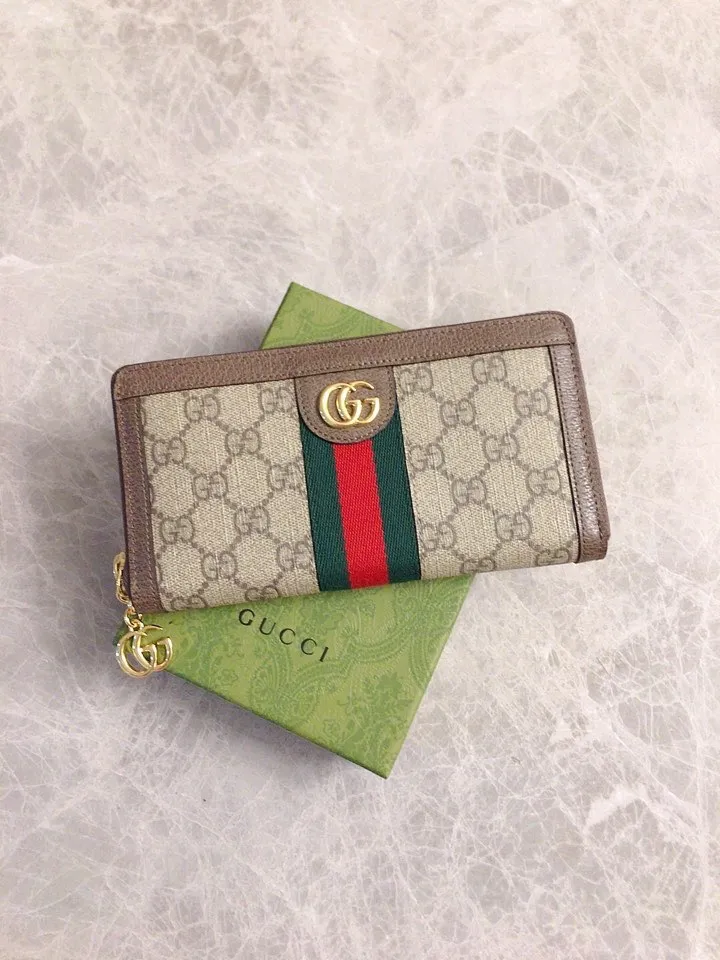 💰410 🇭🇺🇭🇺 The official website is synchronized with the new model! Ophidia series ~ long zipper clip, 🧤🧤 is made of GG Supreme high-grade PVC fabric 🧤🧤 with iconic double G hardware marks, classic red and green webbing, exquisitely made! 🧤🧤Model number: 523154, size: W19xH10xD3cm, color: coffee