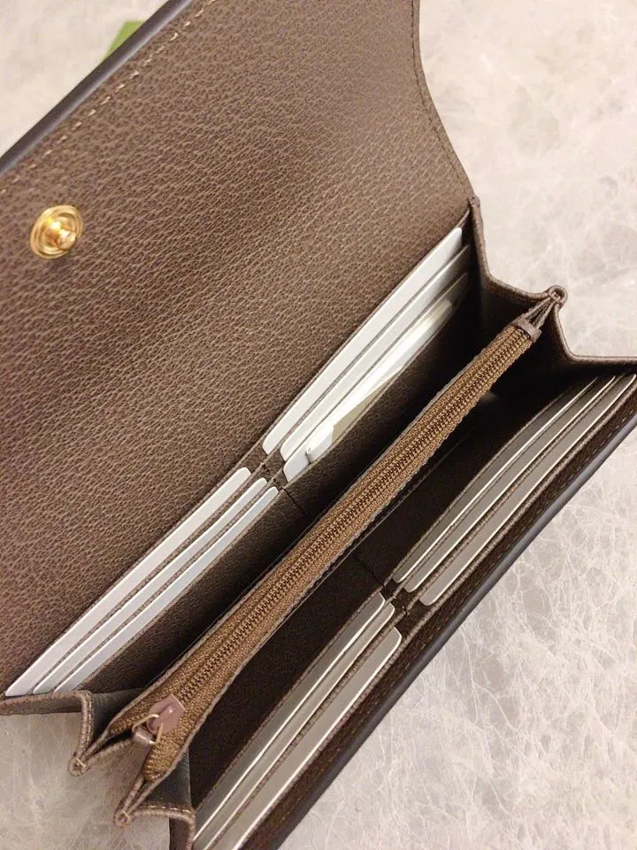 💰410 🇭🇺🇭🇺 The official website is synchronized with the new model! Ophidia series ~ Two-fold long clip, 🎡🎡 is made of GG Supreme high-grade PVC fabric 🎡🎡 with iconic double G hardware marks and classic red and green webbing, exquisitely made! 🎡🎡Model number: 523153, size: W19xH10xD3cm, color: coffee