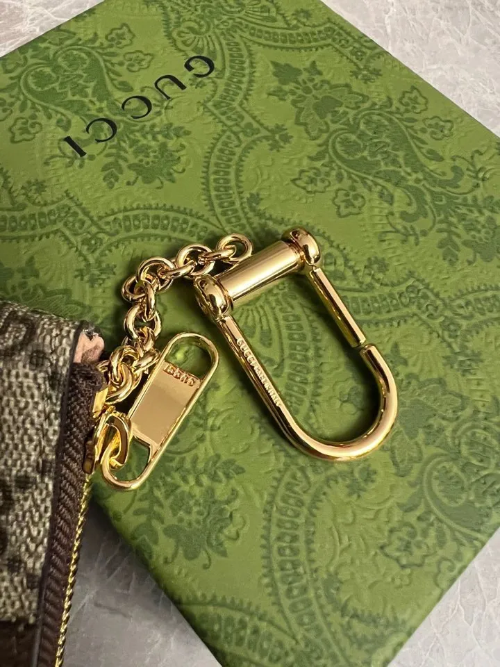 💰340🇭🇺🇭🇺GG brand new small coin purse~lipstick bag🪅🪅made of imported cowhide leather and PVC , 🪅🪅 with exquisite original factory double G hardware 🪅🪅, flexible and unique hook buckle, small and exquisite, great effect, model: 671722, color: brown pvc, size: 12x7.5x1.5cm