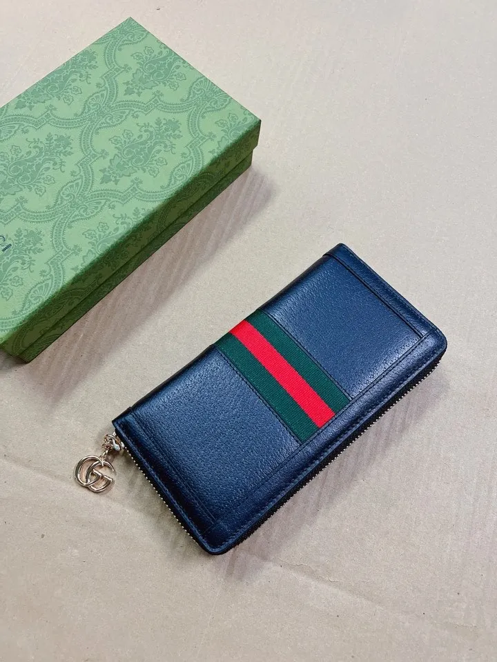 💰440🇭🇺🇭🇺 The official website is synchronized with the new model! Ophidia series ~ zipper wallet, 🍊🍊 is made of GG Supreme original factory pig grain first-layer cowhide 🍊🍊 with iconic double G hardware marks, classic red and green webbing, high-end cotton zipper ~ refined! 🍊🍊Model number: 523154, 🍊🍊Size: W19xH10xD2.5cm, Color: black, white, burgundy