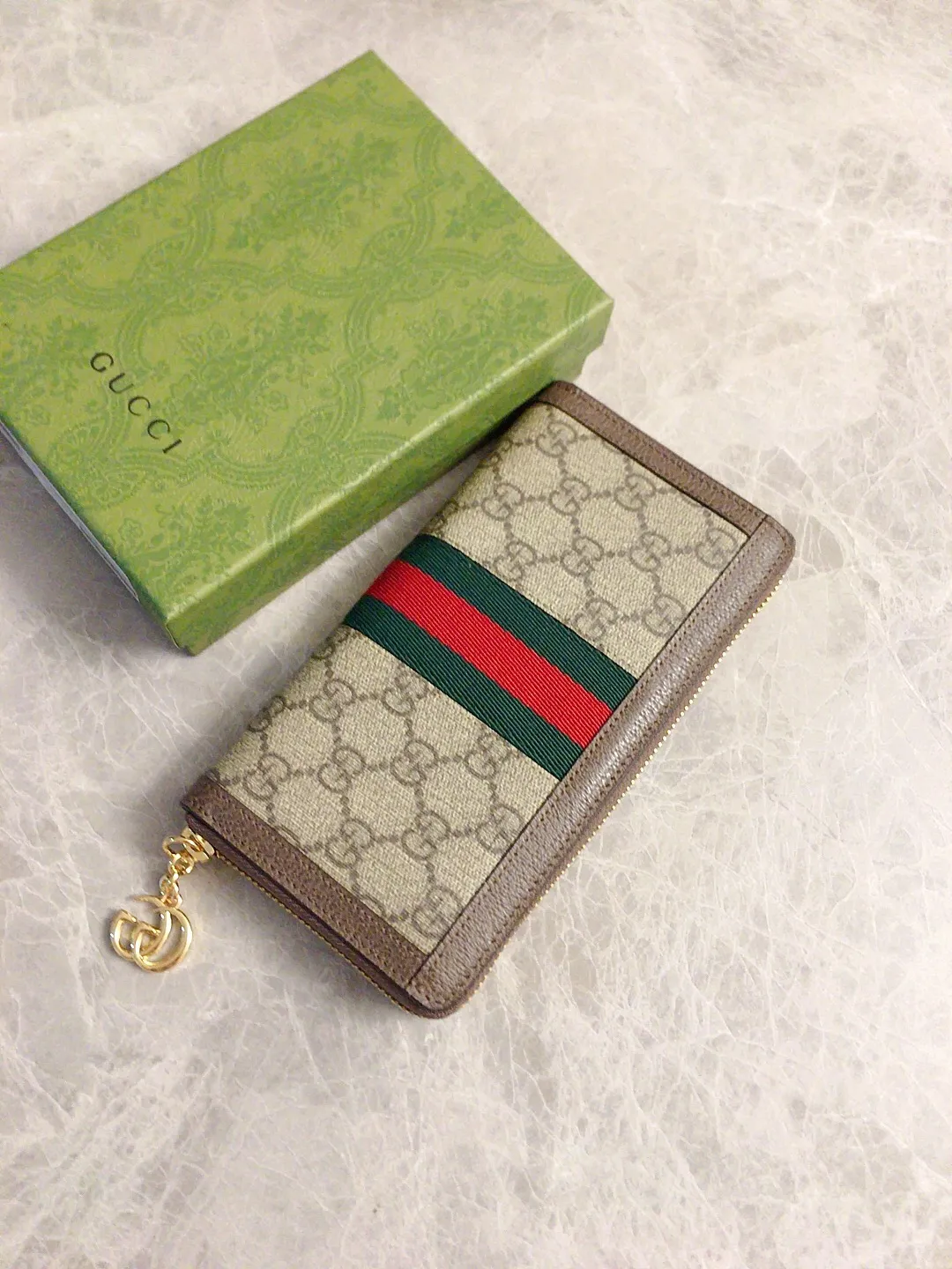 💰410🇭🇺🇭🇺 The official website is synchronized with the new model! Ophidia series ~ long zipper clip, 🧤🧤 is made of GG Supreme high-grade PVC fabric 🧤🧤 with iconic double G hardware marks, classic red and green webbing, exquisitely made! 🧤🧤Model number: 523154, size: W19xH10xD3cm, color: coffee