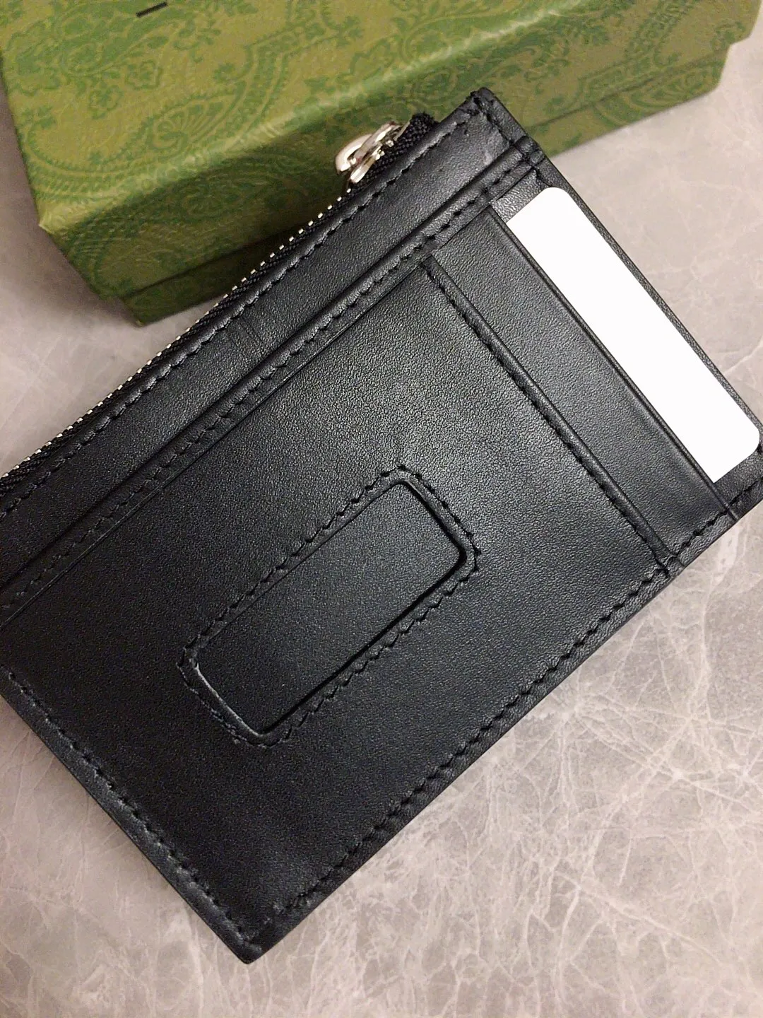 💰330🇭🇺🇭🇺 The official website synchronizes the new model🐡🐡 A slim card holder launched in the Gucci~CY series in the 1970s🐡🐡With multiple pockets and zipper compartments, 🧵Advanced custom embossed original factory cowhide🐡🐡Imported cotton zipper, high-end quality, model number: 597560, size 12x8cm