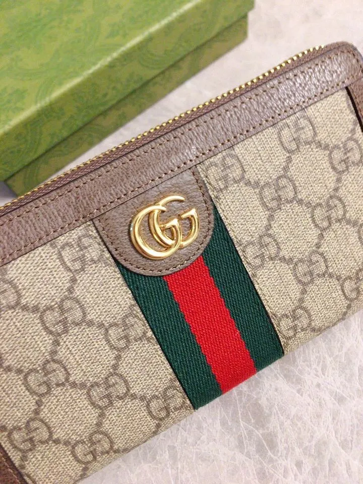 💰410 🇭🇺🇭🇺 The official website is synchronized with the new model! Ophidia series ~ long zipper clip, 🧤🧤 is made of GG Supreme high-grade PVC fabric 🧤🧤 with iconic double G hardware marks, classic red and green webbing, exquisitely made! 🧤🧤Model number: 523154, size: W19xH10xD3cm, color: coffee