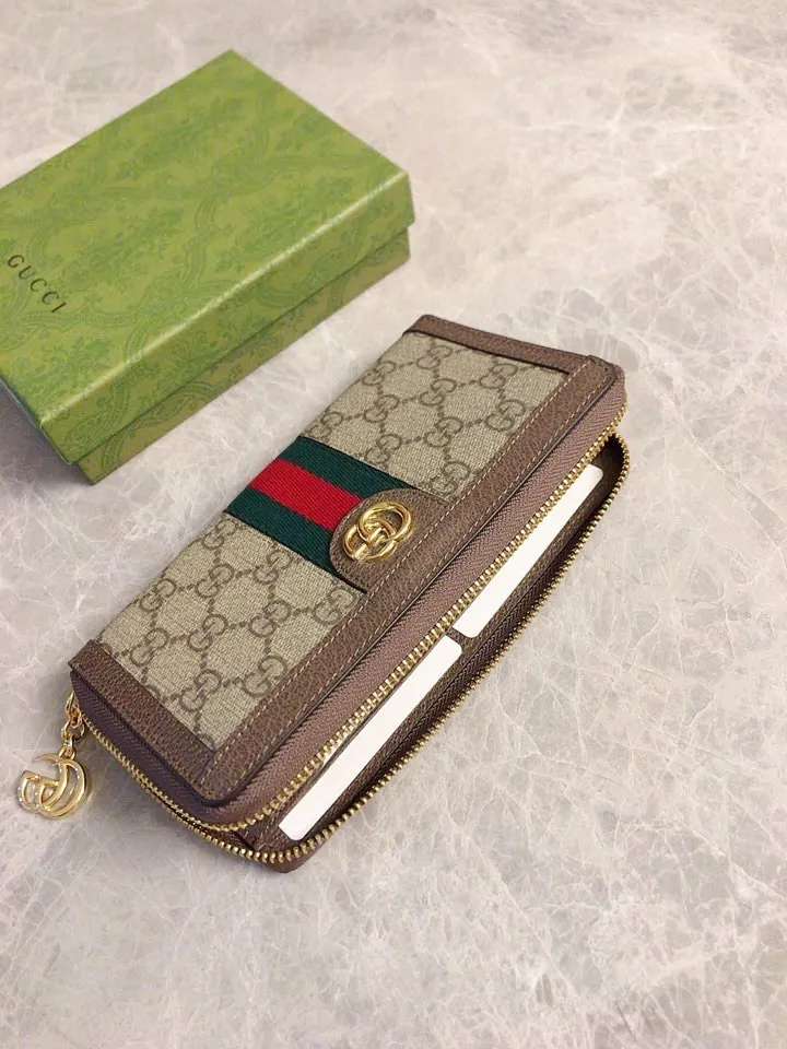 💰410 🇭🇺🇭🇺 The official website is synchronized with the new model! Ophidia series ~ long zipper clip, 🧤🧤 is made of GG Supreme high-grade PVC fabric 🧤🧤 with iconic double G hardware marks, classic red and green webbing, exquisitely made! 🧤🧤Model number: 523154, size: W19xH10xD3cm, color: coffee