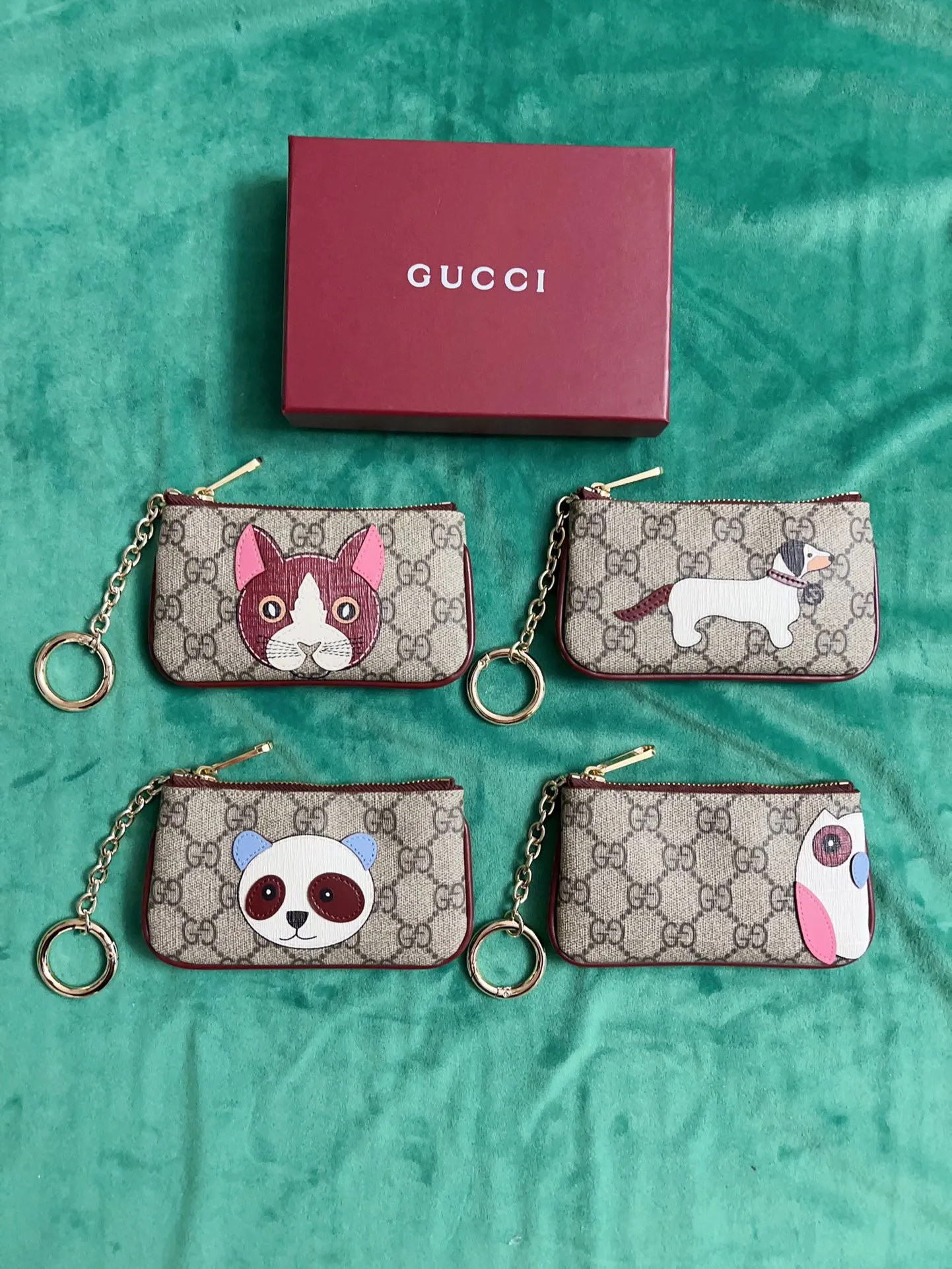 💰360 🇭🇺🇭🇺New products on official website! Exquisite key bag 🔑 ~ lipstick bag 💄🐹🐹 pvc with burgundy calfskin, with cute and exquisite cartoon patterns on the leather! 🐹🐹Style number 818768, size: 12x8x1.5cm, 🐹🐹Little red cat, puppy, panda, owl, exquisite and cute! Original product!