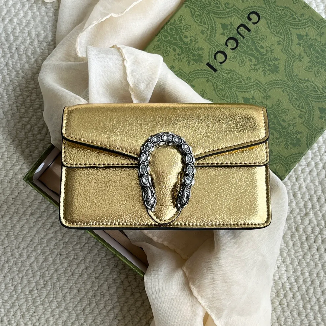 Actual shot #💰260 with box model: 476432 gold leather size: 16.5x10x4.5cm 𝙂𝙪𝙘𝙘𝙞 𝘿𝙞𝙤𝙣𝙮𝙨𝙪𝙨 𝙈𝙞𝙣𝙞 16.5 Xiaogujia’s entry-level small bag is recommended. It’s not worth mentioning. It’s a classic model that can be said to be the symbol of Xiaogujia. The classic mini Dionysian buckle is paired with calfskin. This bag has a very high appearance rate. It is simply a tool for daily wear and is very popular on the street❗️