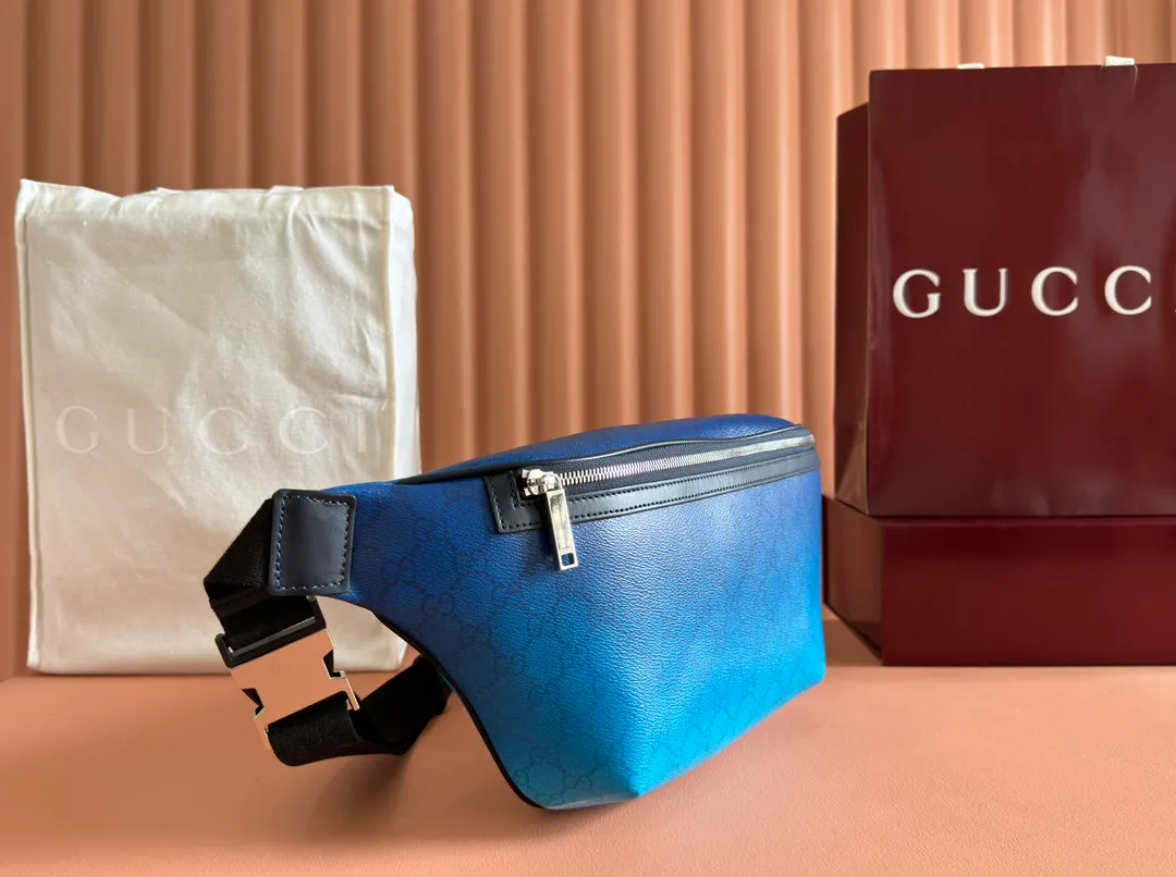 p900💋💋💋【Full set of packaging at the counter】gjia’s unique blue gradient effect printing adds a fashionable aesthetic to this basic functional item. This cross-body bag is made of GG Monogram coated fabric, with all-over gradient printing showing off its ingenious design. Gradient blue GG Monogram coated fabric, dark blue leather trim, all-over gradient print, blue cotton and linen lining, zipper closure, size: 835810. Dimensions: 39cm (width) x 17cm (height) x 4cm (depth) Weight: approx. 0.5kg Color: gradient blue/original leather. Made in Italy