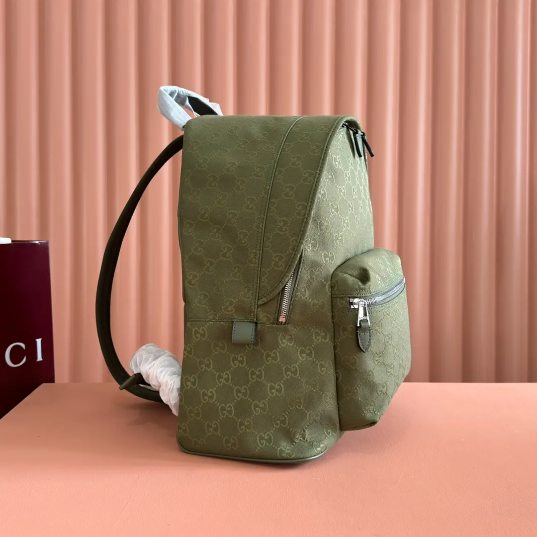p1240. 💋💋💋【With full set of original counter packaging】【New Product】This backpack is crafted with GG canvas to pay tribute to the instantly recognizable monogram pattern of Guccio Gucci, the founder of the brand. Interpreting a new forest green tone, it adds a modern touch to daily accessories, and the webbing details double the charm of the entire design. Forest green GG canvas Forest green leather trim Red and green web detail Gucci branding on the back Nylon lining Padded mesh on the back Adjustable padded shoulder strap Interior: 1 padded laptop compartment, 1 open pocket External: One zippered pocket Handle height: 8 cm Zipper closure Ident number: 834464. Dimensions: 35cm (width) x 40cm (height) x 20cm (depth) Weight: approx. 1.3kg Color: Forest green cloth. Made in Italy