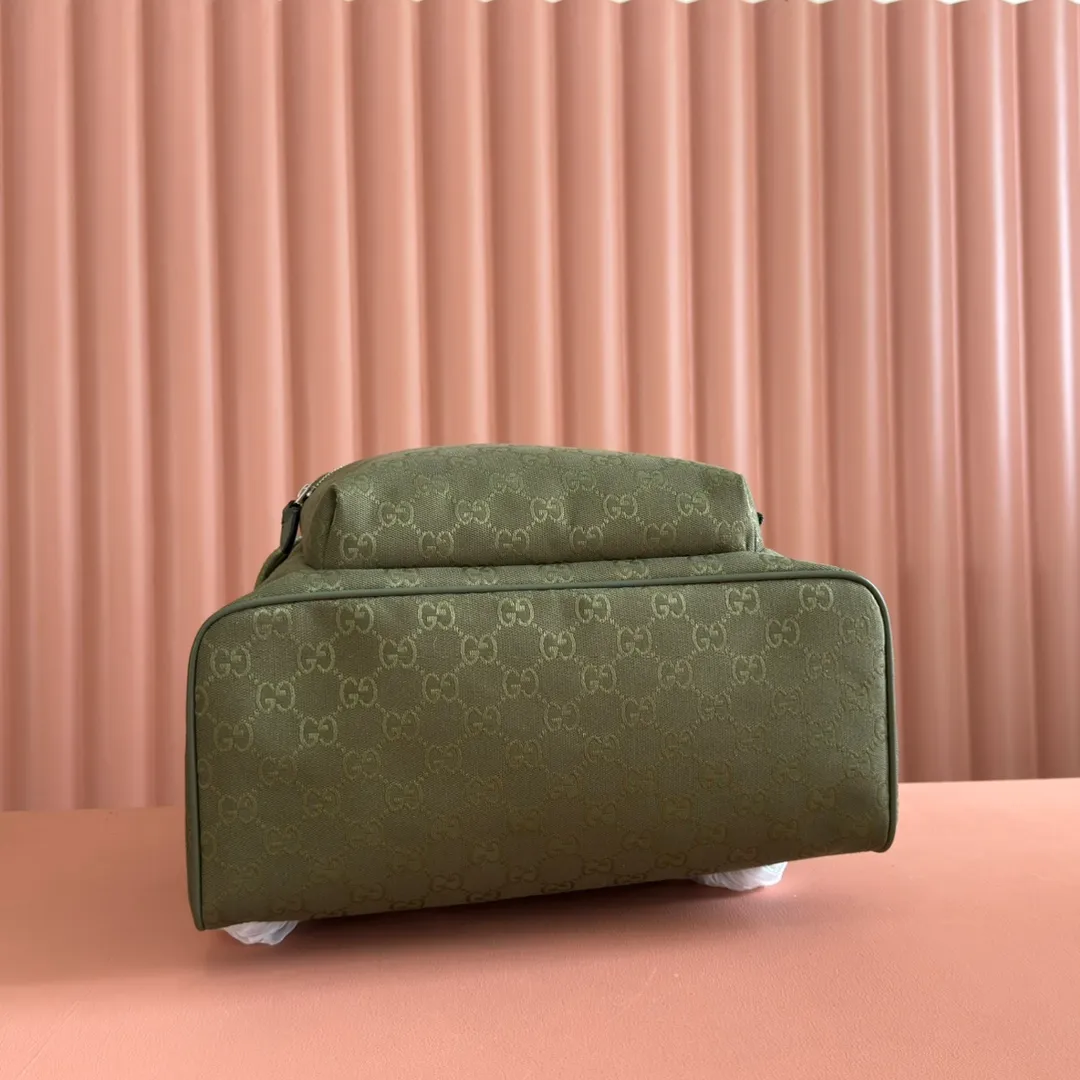 p1240. 💋💋💋【With full set of original counter packaging】【New Product】This backpack is crafted with GG canvas to pay tribute to the instantly recognizable monogram pattern of Guccio Gucci, the founder of the brand. Interpreting a new forest green tone, it adds a modern touch to daily accessories, and the webbing details double the charm of the entire design. Forest green GG canvas Forest green leather trim Red and green web detail Gucci branding on the back Nylon lining Padded mesh on the back Adjustable padded shoulder strap Interior: 1 padded laptop compartment, 1 open pocket External: One zippered pocket Handle height: 8 cm Zipper closure Ident number: 834464. Dimensions: 35cm (width) x 40cm (height) x 20cm (depth) Weight: approx. 1.3kg Color: Forest green cloth. Made in Italy