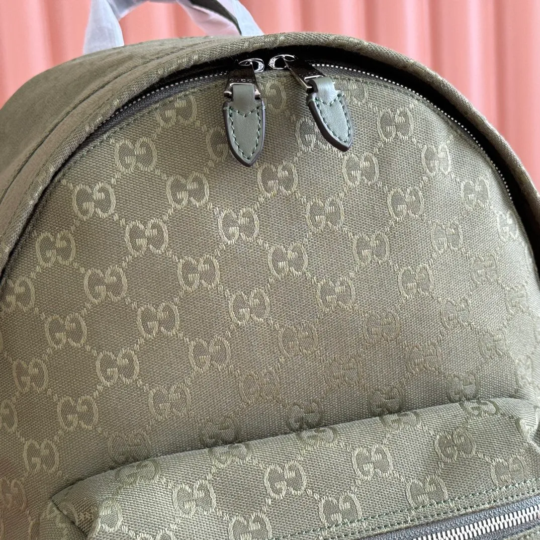 p1240. 💋💋💋【With full set of original counter packaging】【New Product】This backpack is crafted with GG canvas to pay tribute to the instantly recognizable monogram pattern of Guccio Gucci, the founder of the brand. Interpreting a new forest green tone, it adds a modern touch to daily accessories, and the webbing details double the charm of the entire design. Forest green GG canvas Forest green leather trim Red and green web detail Gucci branding on the back Nylon lining Padded mesh on the back Adjustable padded shoulder strap Interior: 1 padded laptop compartment, 1 open pocket External: One zippered pocket Handle height: 8 cm Zipper closure Ident number: 834464. Dimensions: 35cm (width) x 40cm (height) x 20cm (depth) Weight: approx. 1.3kg Color: Forest green cloth. Made in Italy