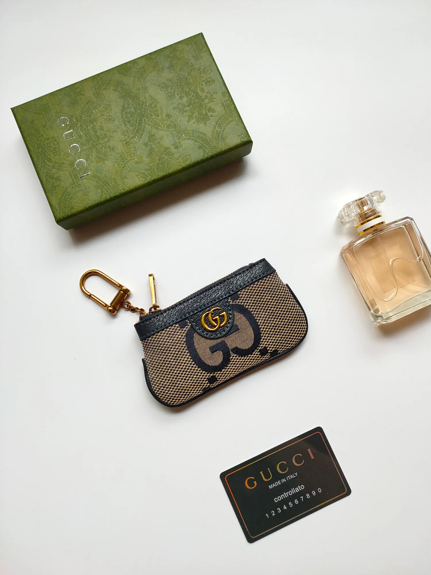 💰130💰New small coin purse~The lipstick bag is made of Gucci's new large-character fabric, with exquisite original factory bronze double G hardware and flexible and unique hook buckles. It is small and exquisite, but has great effect. Model: 671722, size: 12.5x7x1.5cm