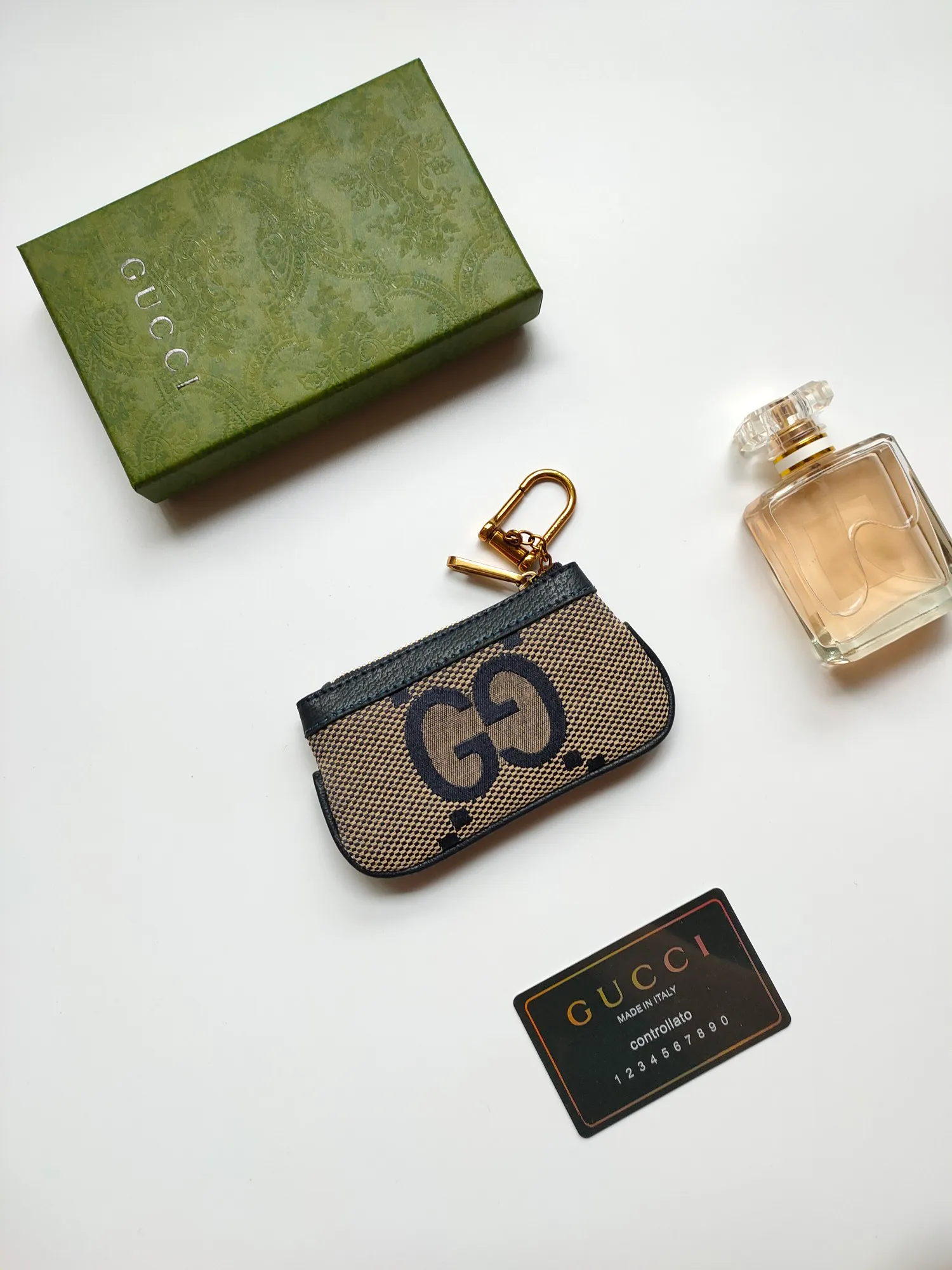 💰130💰New small coin purse~The lipstick bag is made of Gucci's new large-character fabric, with exquisite original factory bronze double G hardware and flexible and unique hook buckles. It is small and exquisite, but has great effect. Model: 671722, size: 12.5x7x1.5cm
