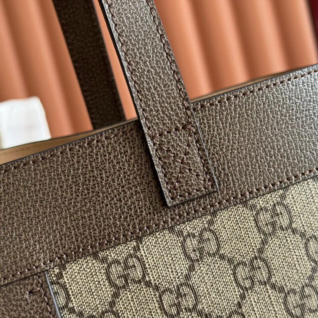 p1120. 💋💋💋G Home👉New style. The market's top exclusive goods control, special/counter quality 💯Using imported cowhide, original hardware! Exquisite workmanship. 💯Exclusive physical photos📷👉The quality can be seen in the picture👄👄😘😘. Style number: 547947. Dimensions: width 44*height 33*side width 15. Color: brown/brown pvc.