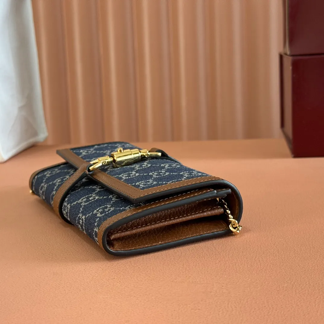 p700. 💋💋💋【Original leather accessories🌈 Equipped with full counter packaging】🔥🔥 The jackie1961 series launches a compact and noble new chain bag. The gold-toned push-lock buckle, detachable chain, and classic double G monogram denim fabric make the entire design exude elegance and timelessness. Size: 19*10*3.5. Model: 652681.