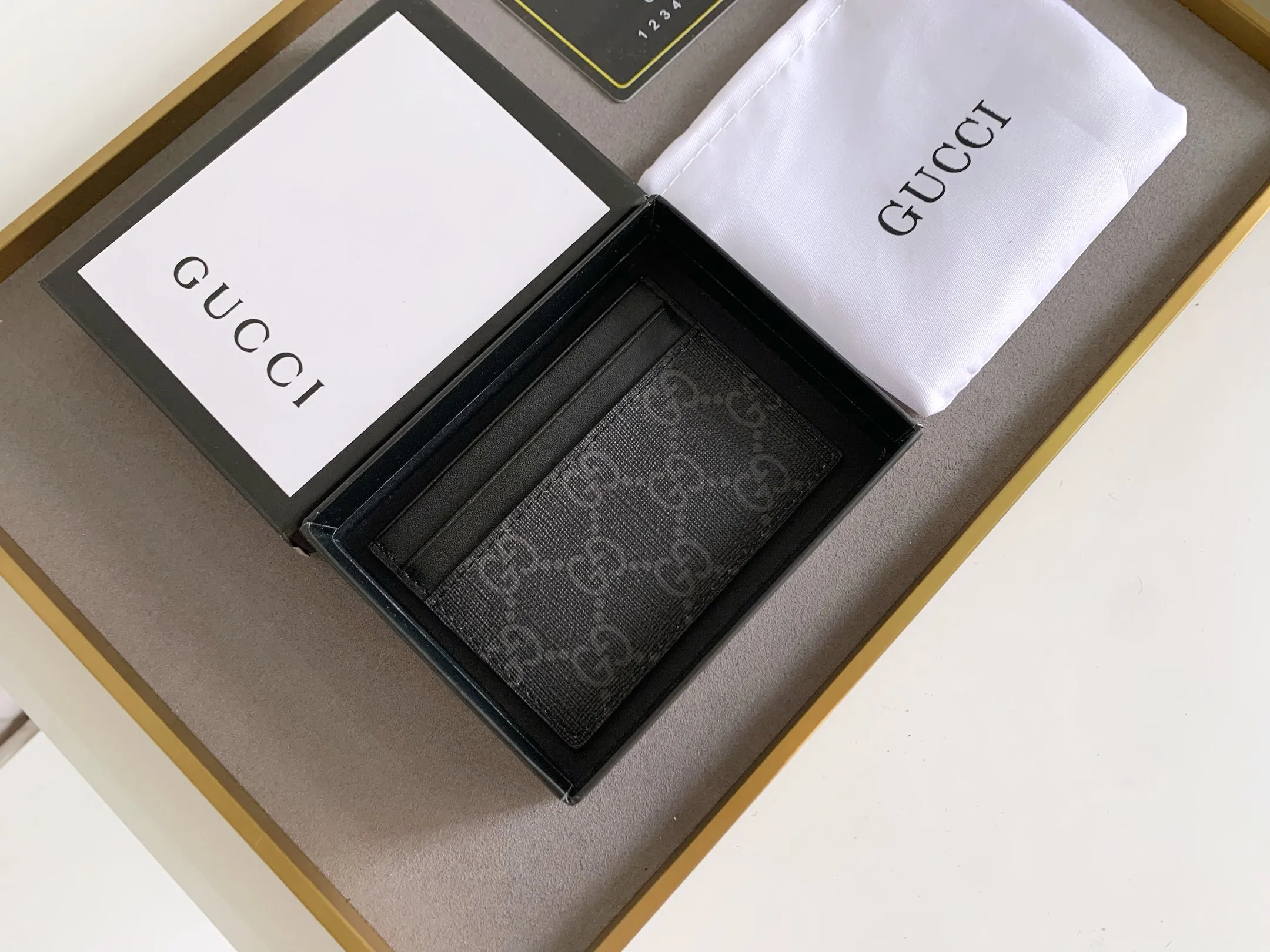 💰90 💎(Snake pattern) Top original quality, GUCCI classic popular printed card holder, exclusive background, real shot. The card holder is made of GG Supreme high-grade man-made canvas with exquisite patterns💯! Style number: 451277 Size: 10x7.5cm