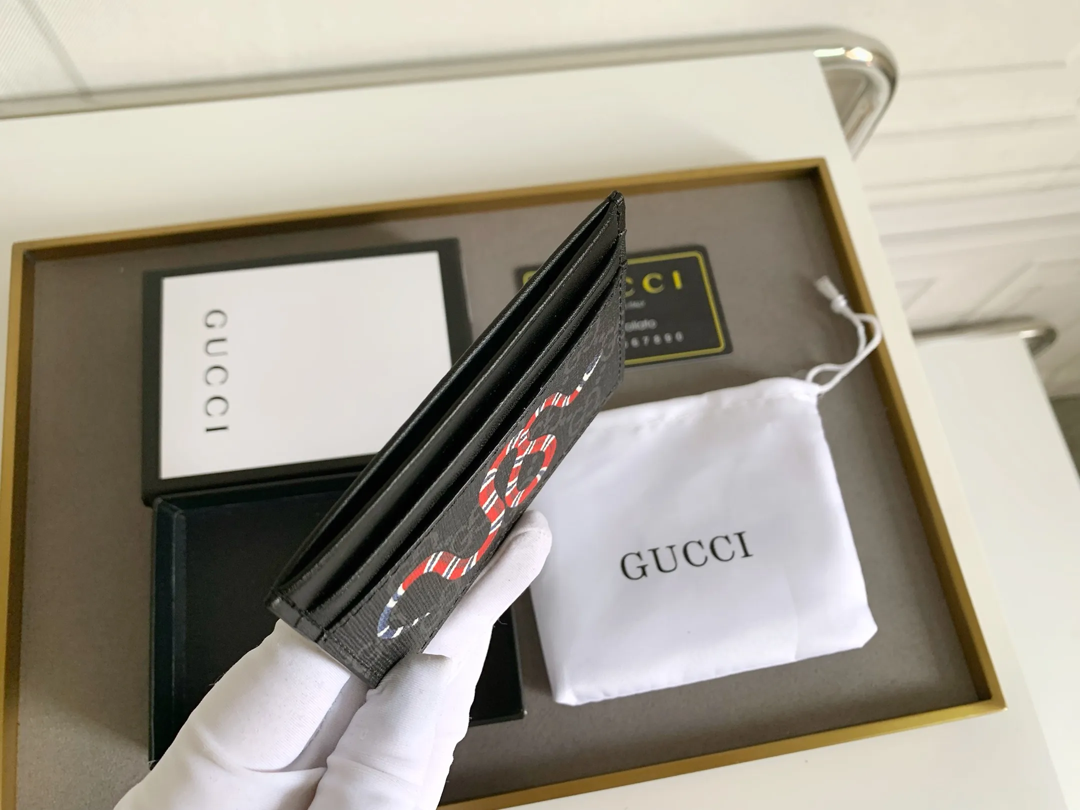 💰90 💎(Snake pattern) Top original quality, GUCCI classic popular printed card holder, exclusive background, real shot. The card holder is made of GG Supreme high-grade man-made canvas with exquisite patterns💯! Style number: 451277 Size: 10x7.5cm