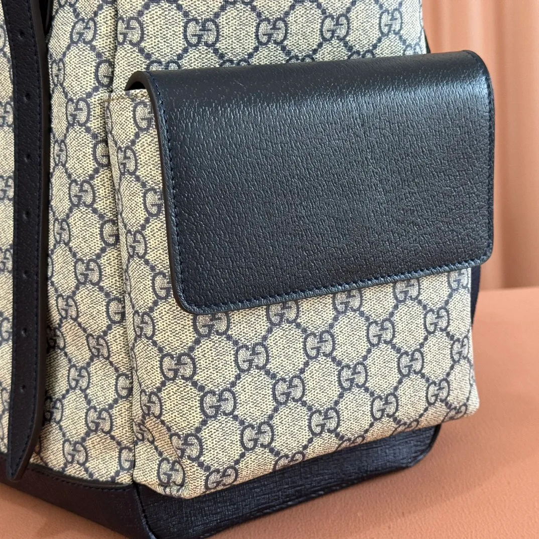 p1280. 🔥🔥🔥【With full set of original green gift bag】Ophidia series medium GG backpack. The 2024 early spring series renews the Ophidia series shoulder bags, tote bags and handbags in black GG denim, and the silver-toned accessories present a contrasting metallic texture. This Ophidia backpack in blue and black GG Supreme canvas demonstrates Gucci's design prowess in infusing the brand's iconic design elements with a modern appeal. Blue and black GG Supreme canvas, black leather piping, palladium tone hardware, cotton and linen blend lining, black mesh Double G on the back, flap side pockets with magnetic closure, inner phone pocket and padded tablet sleeve, adjustable shoulder strap, black mesh back, drawstring flap design, leather buckle fastening strap and extra magnetic buckle for easy opening and closing, weight: approx. 1.272 kg. Model: 598140. Dimensions: 40(length) x 24(width) x 16cm(thickness) Color: blue/pvc. Made in Italy