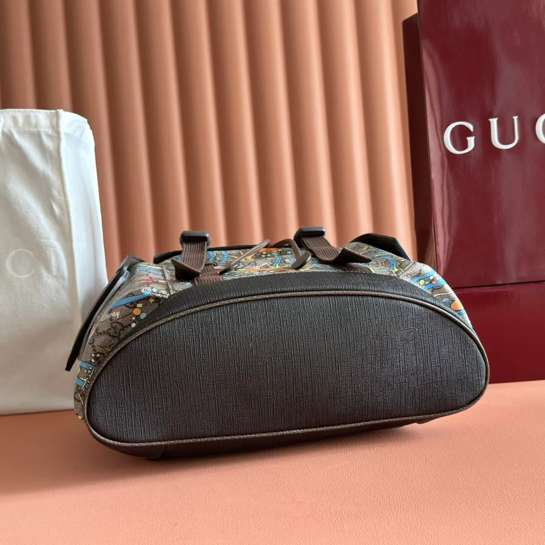 p1320. 📣📣📣【Original leather with full counter packaging】‼ ️G Home👉New style. The market's top exclusive goods control, special/counter quality 💯Using imported cowhide, original hardware! Exquisite workmanship. 💯Exclusive physical photos📷👉The quality can be seen in the picture👄👄😘😘. Style number: 645051. Dimensions: Width 34.5*Height 44*Side width 12.5. Color: Model: Brown PVC/Donald Duck