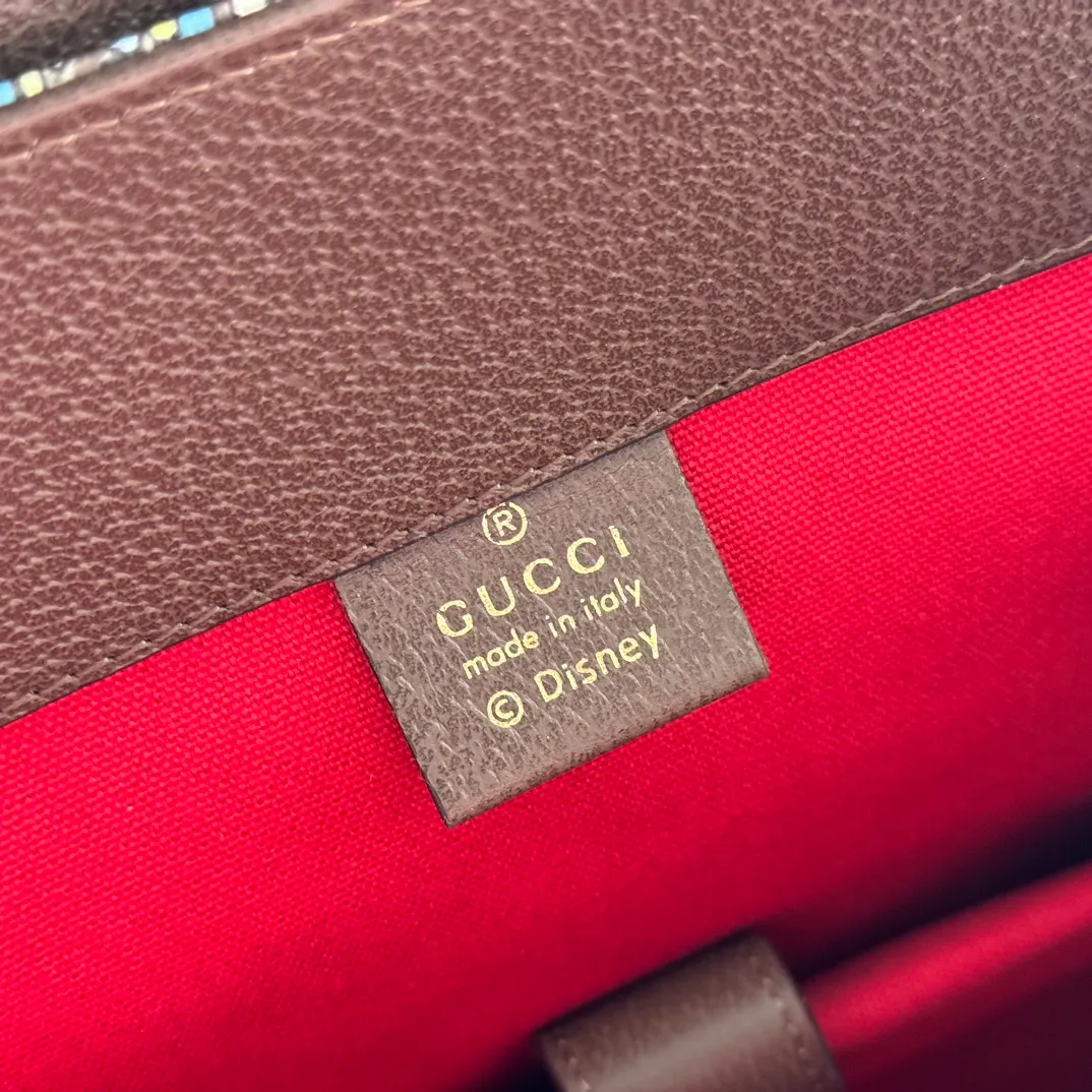 p1320. 📣📣📣【Original leather with full counter packaging】‼ ️G Home👉New style. The market's top exclusive goods control, special/counter quality 💯Using imported cowhide, original hardware! Exquisite workmanship. 💯Exclusive physical photos📷👉The quality can be seen in the picture👄👄😘😘. Style number: 645051. Dimensions: Width 34.5*Height 44*Side width 12.5. Color: Model: Brown PVC/Donald Duck
