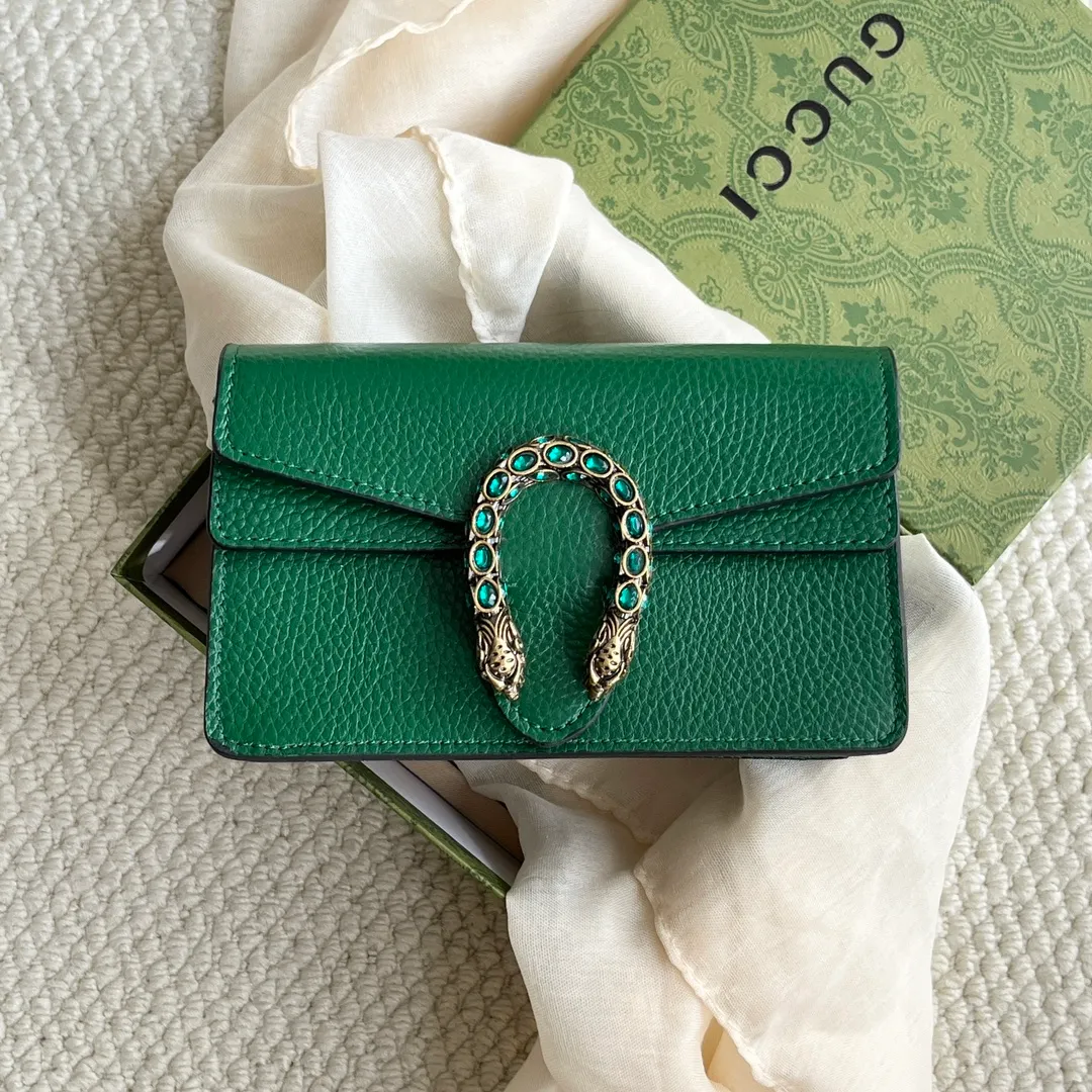 Actual shot #💰260 with box model: 476432 green leather size: 16.5x10x4.5cm 𝙂𝙪𝙘𝙘𝙞 𝘿𝙞𝙤𝙣𝙮𝙨𝙪𝙨 𝙈𝙞𝙣𝙞 16.5 Xiaogujia’s entry-level small bag is recommended. It’s not worth mentioning. It’s a classic model that can be said to be the symbol of Xiaogujia. The classic mini Dionysian buckle is paired with calfskin. This bag has a very high appearance rate. It is simply a tool for daily wear and is very popular on the street❗️